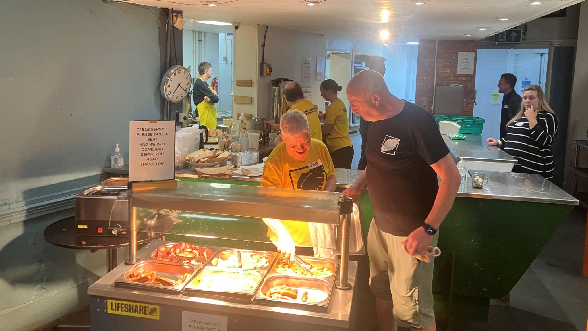 Breakfast being served at Lifeshare's premises on Dale Street.