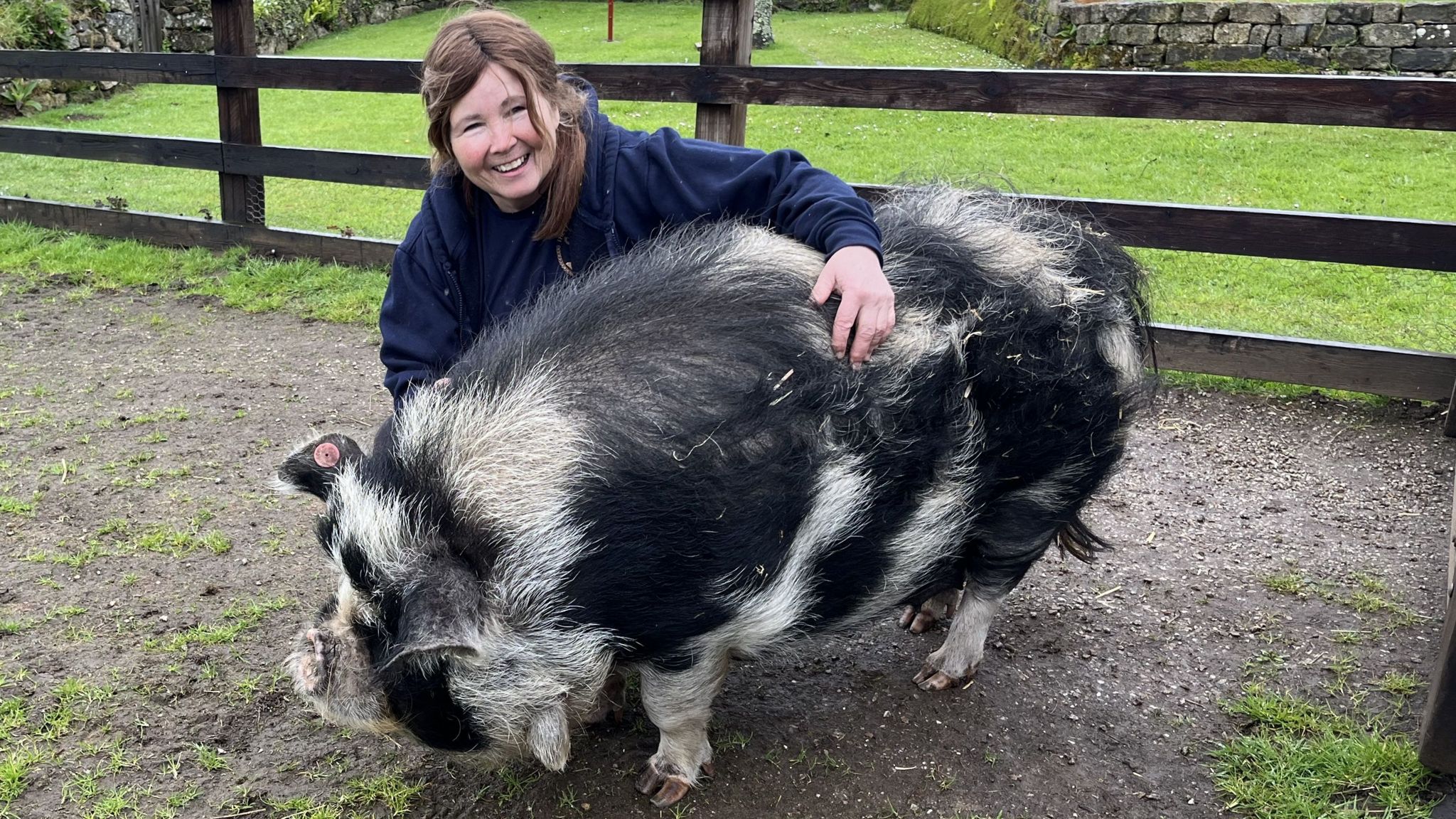 Eileen Keeling with Peppa the pig at the Cinnamon Trust