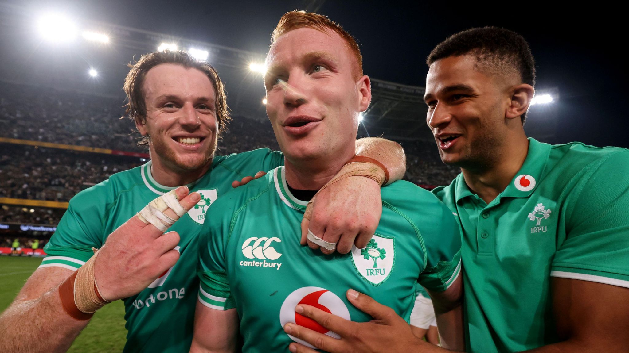 Ciaran Frawley celebrates with Ryan Baird and Cormac Izuchukwu