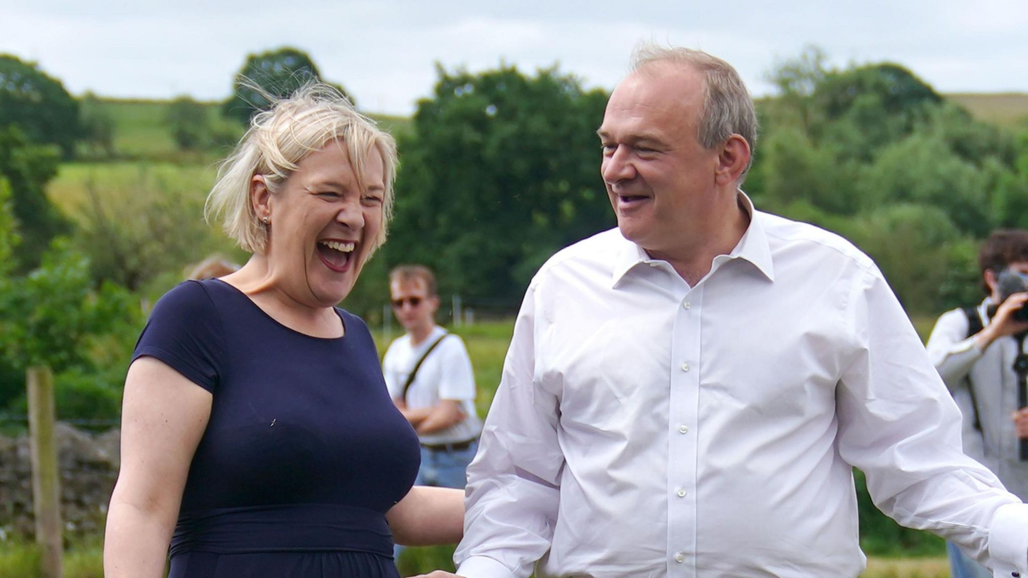 Liberal Democrat leader Sir Ed Davey with Lisa Smart, Liberal Democrat candidate for Hazel Grove (on his left) during a visit to Vale House, Marple Bridge in Greater Manchester while on the General Election campaign trail.