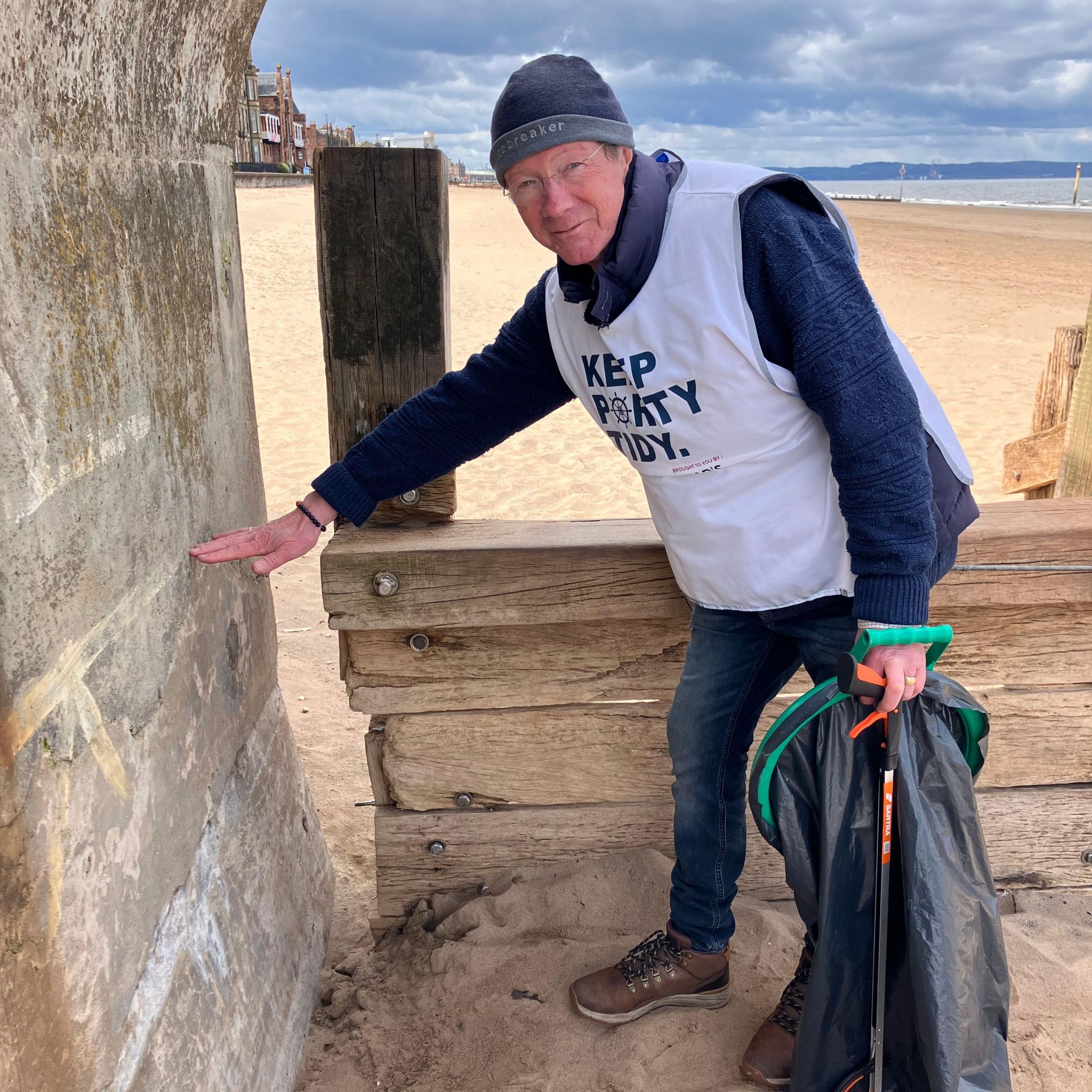 Colin Cornwall from Portobello shows where the sand level on the beach used to be