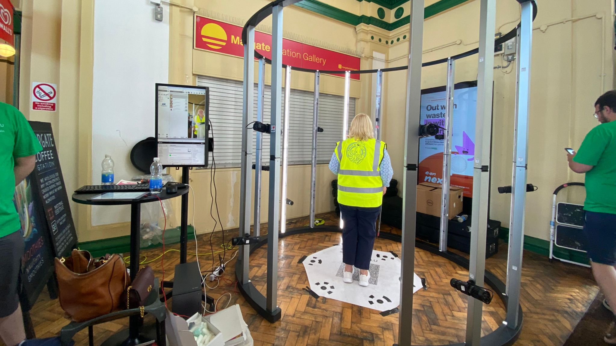 A member of Margate WI standing in a scanner for the miniature models