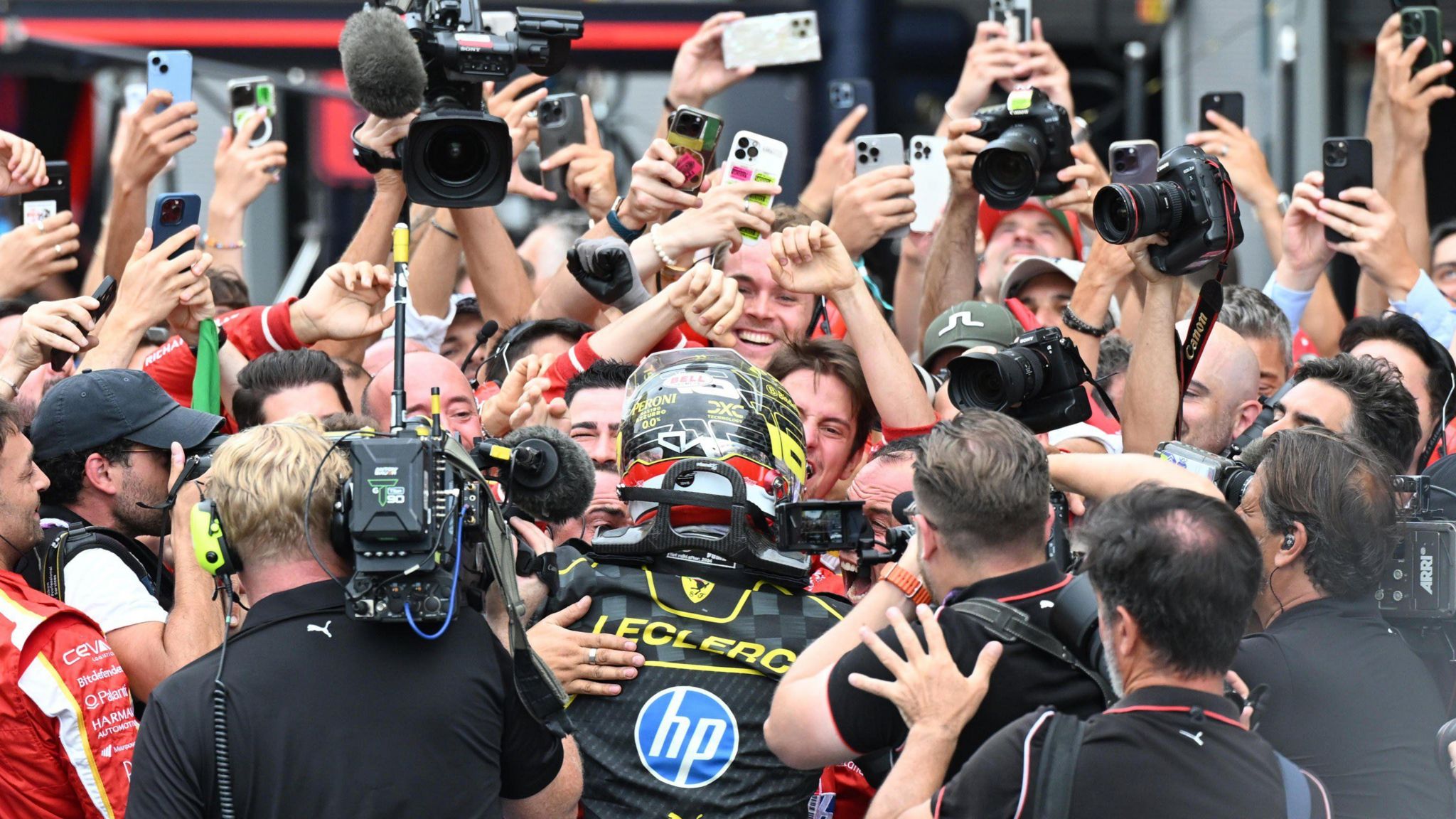 Charles Leclerc celebrates with his crew