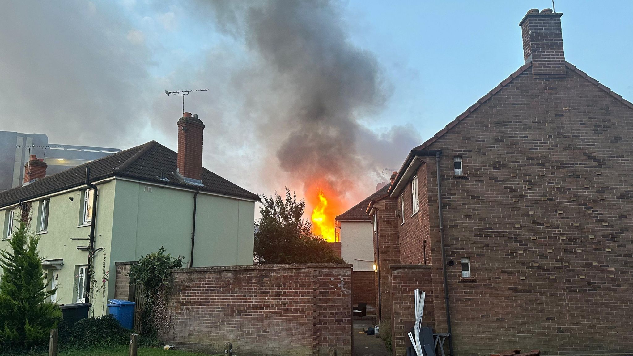 Flames can be seen coming from a house in Portman Road