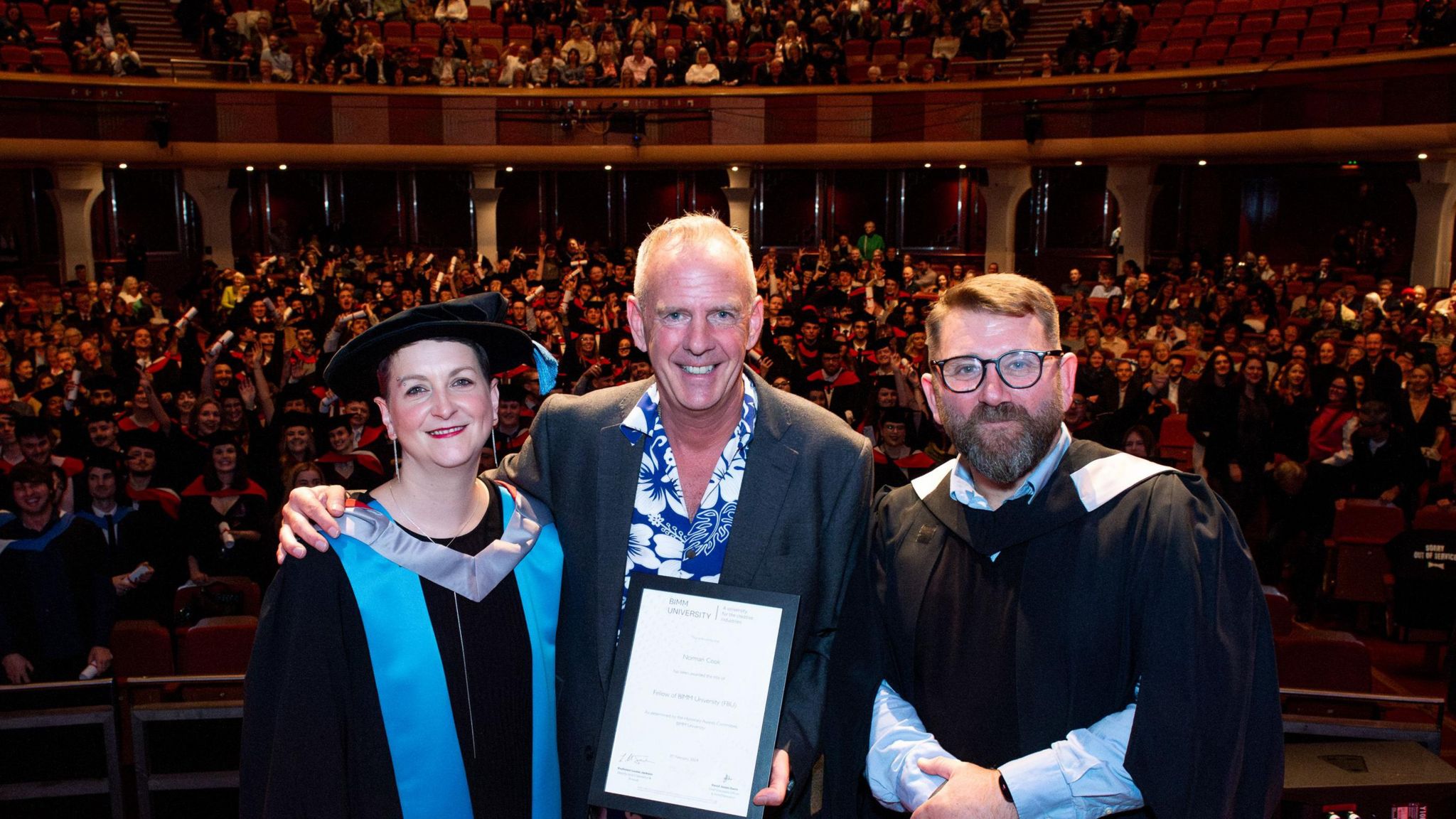 Fatboy Slim on stage after accepting his honorary fellowship