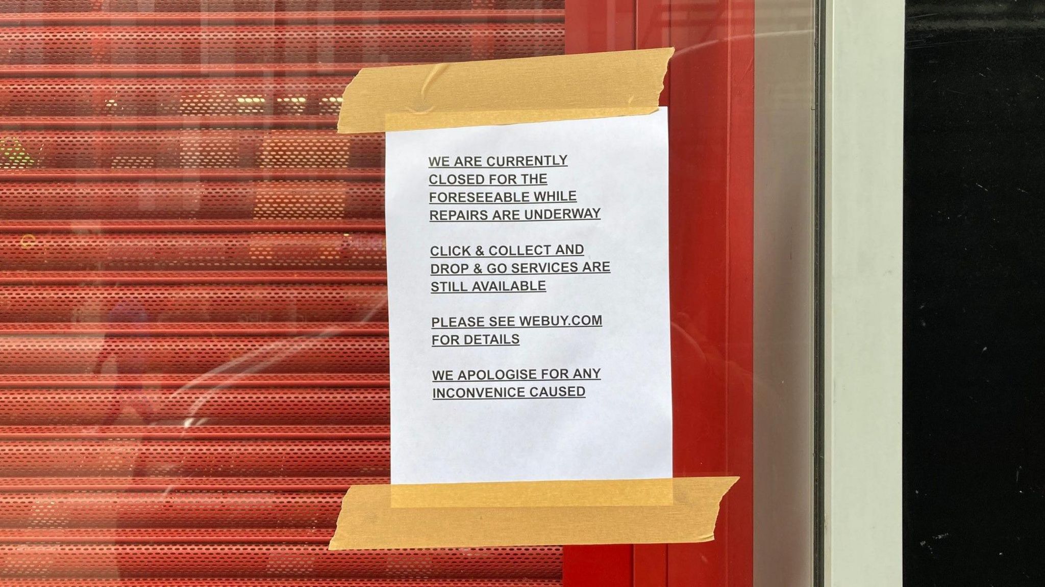 A sign outside CeX electronics retail and repair shop on Broadway  
