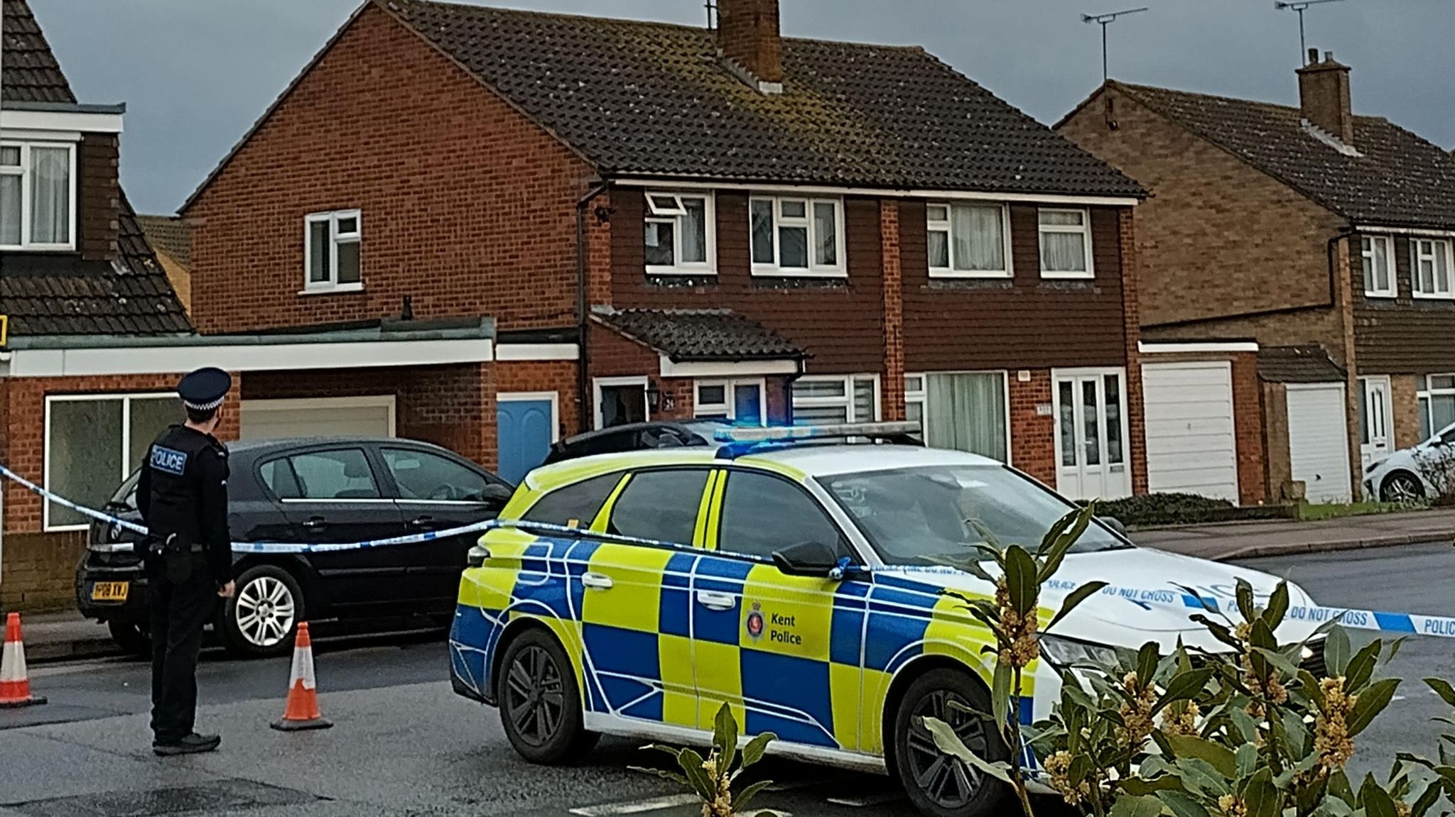 Police outside an address on Adelaide Drive
