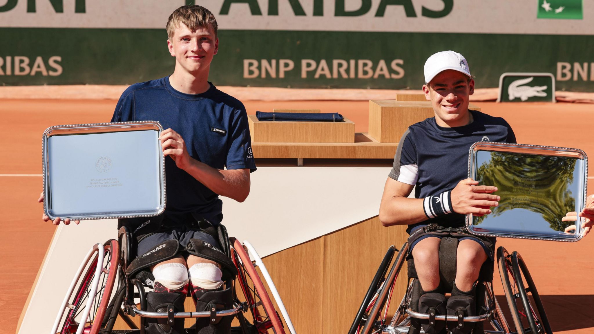 Ruben and his tennis doubles partner in their wheelchairs