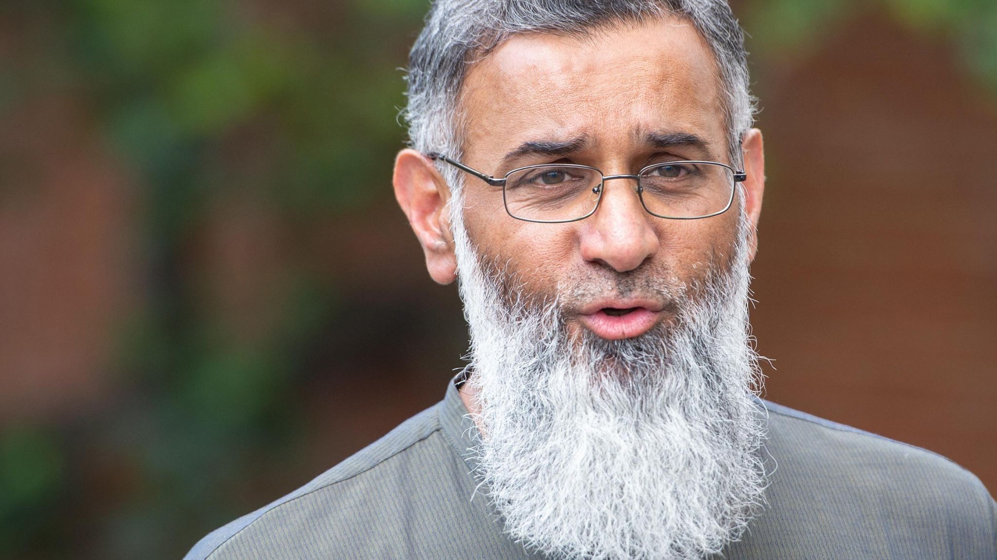 A close up head shot of Anjem Choudary when he was speaking to the media in 2021