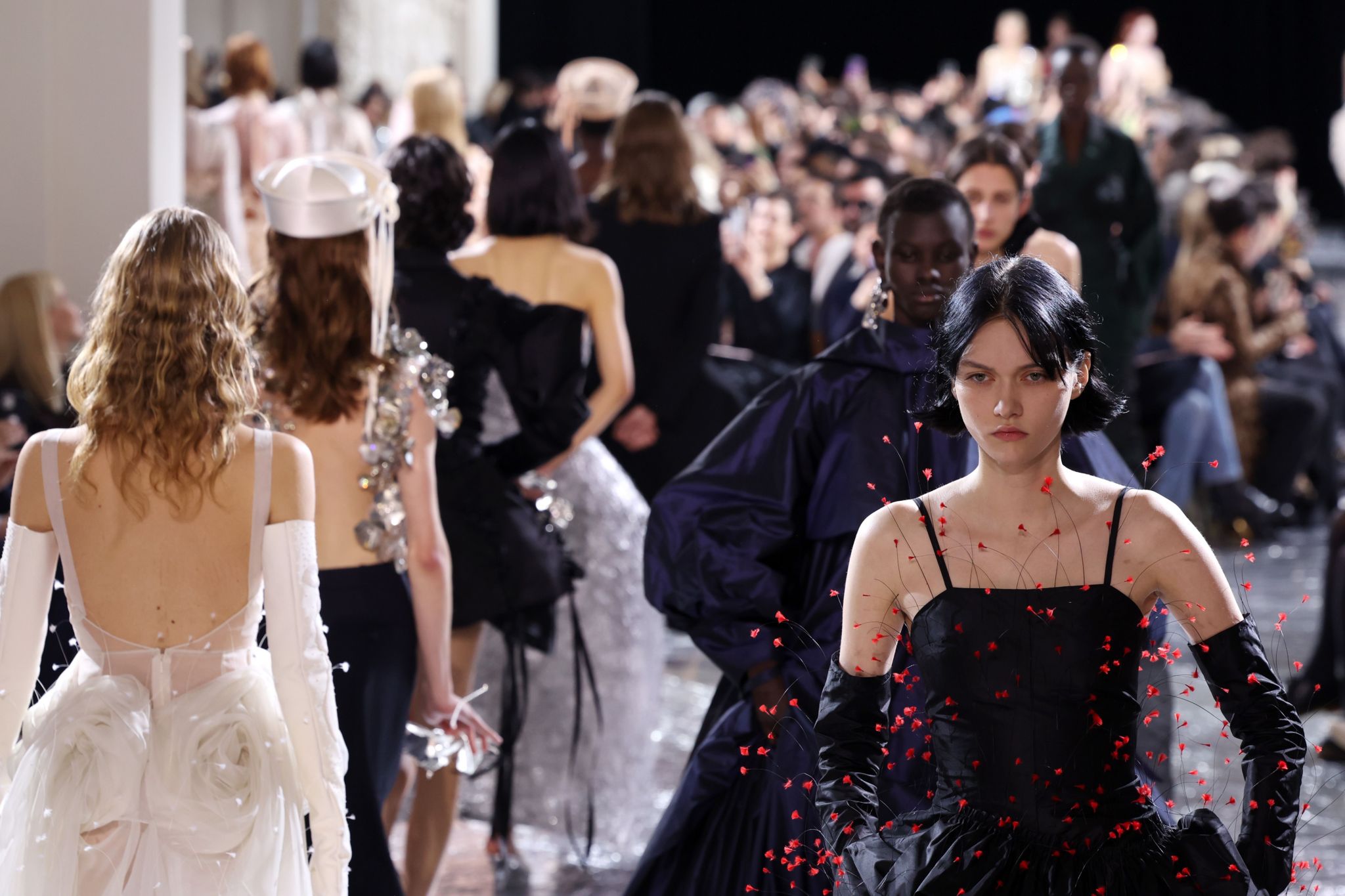 Models at Jean-Paul Gaultier couture show, designed by Simone Rocha