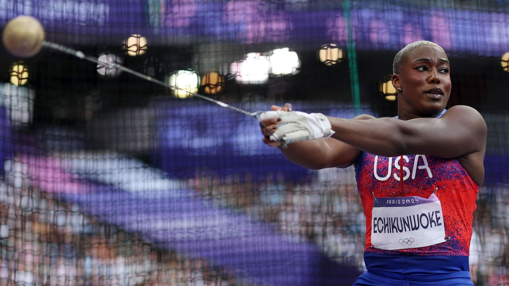 Annette Echikunwoke prepares to release the hammer during the Paris 2024 competition