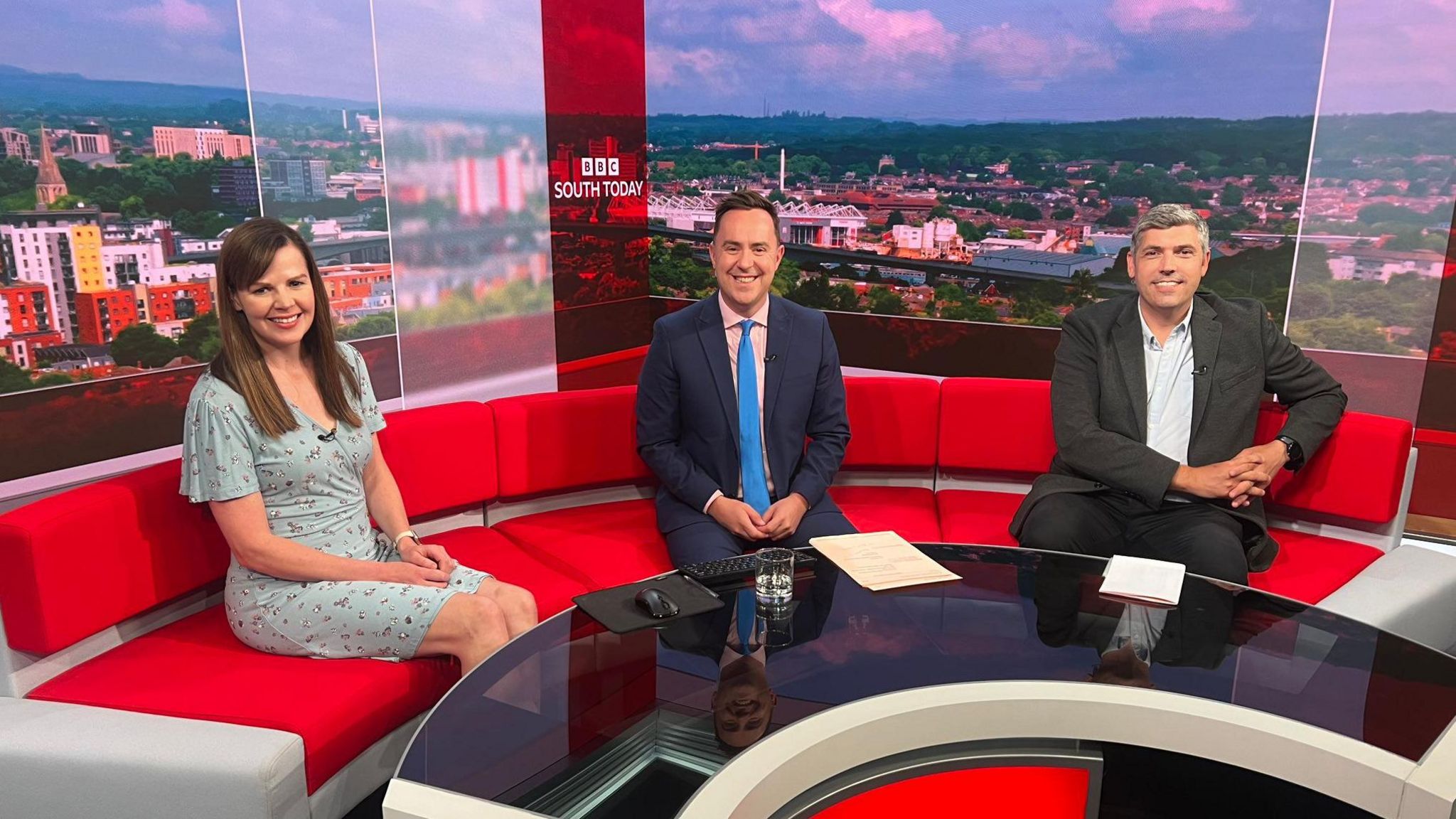 Alexis Green (left) sits in the BBC South Today studio with presenter Edward Sault and sports presenter Lewis Coombes (right)