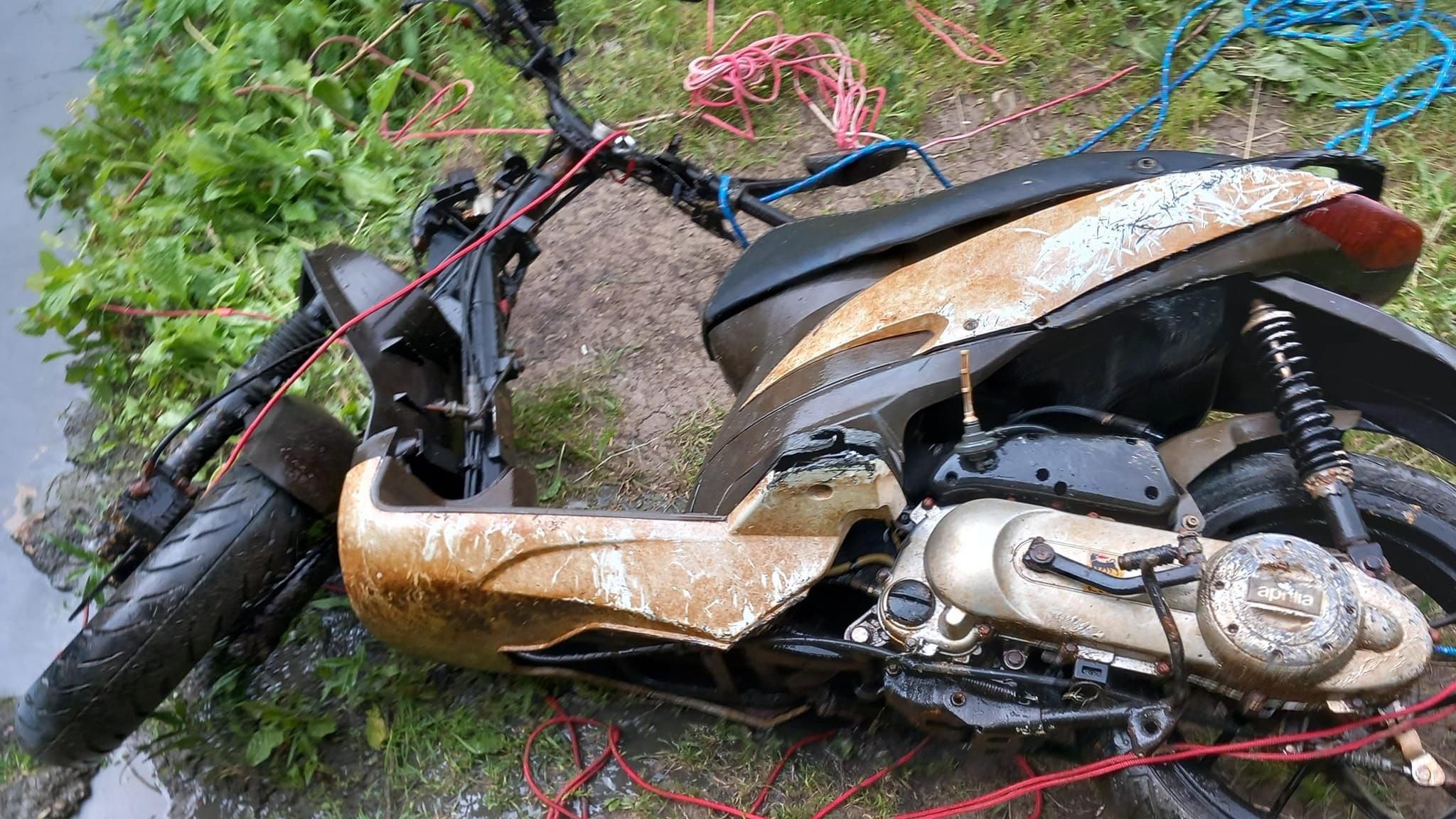 Stolen bike lying on the ground by the river 