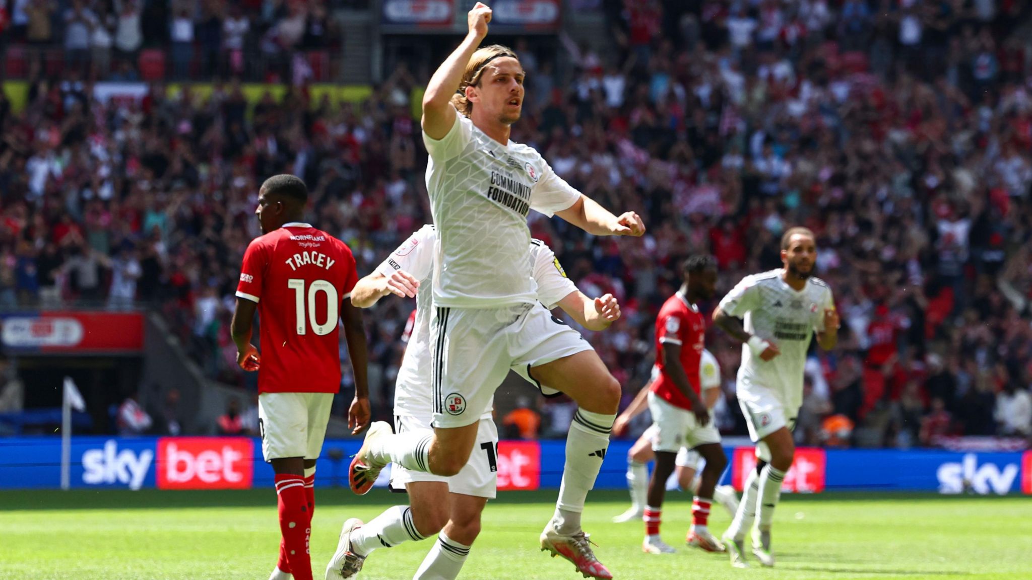 Danilo Orsi celebrates scoring against Crewe Alexandra in the League Two play-off final at Wembley