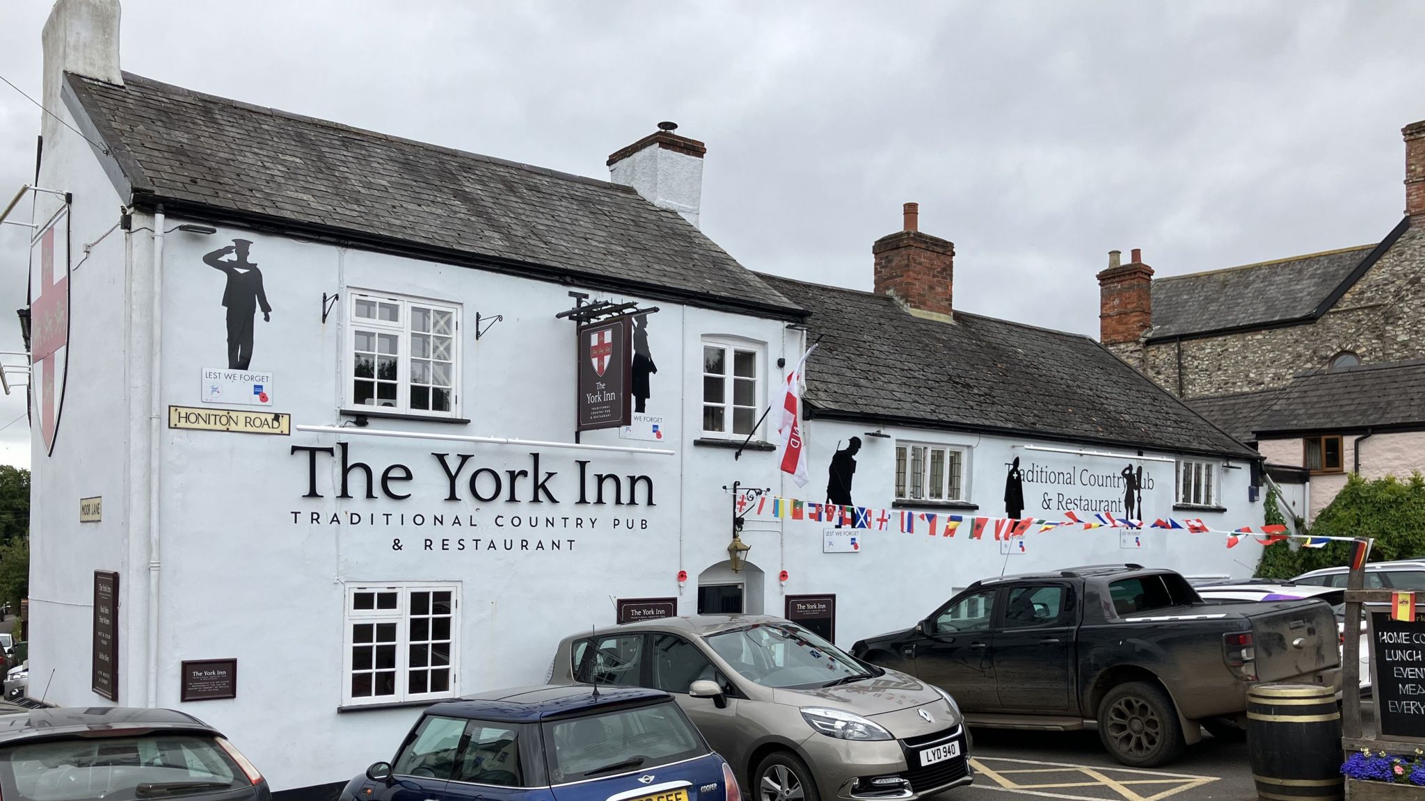 The York Inn building surrounded by cars and and adorned with WW1 imagery 