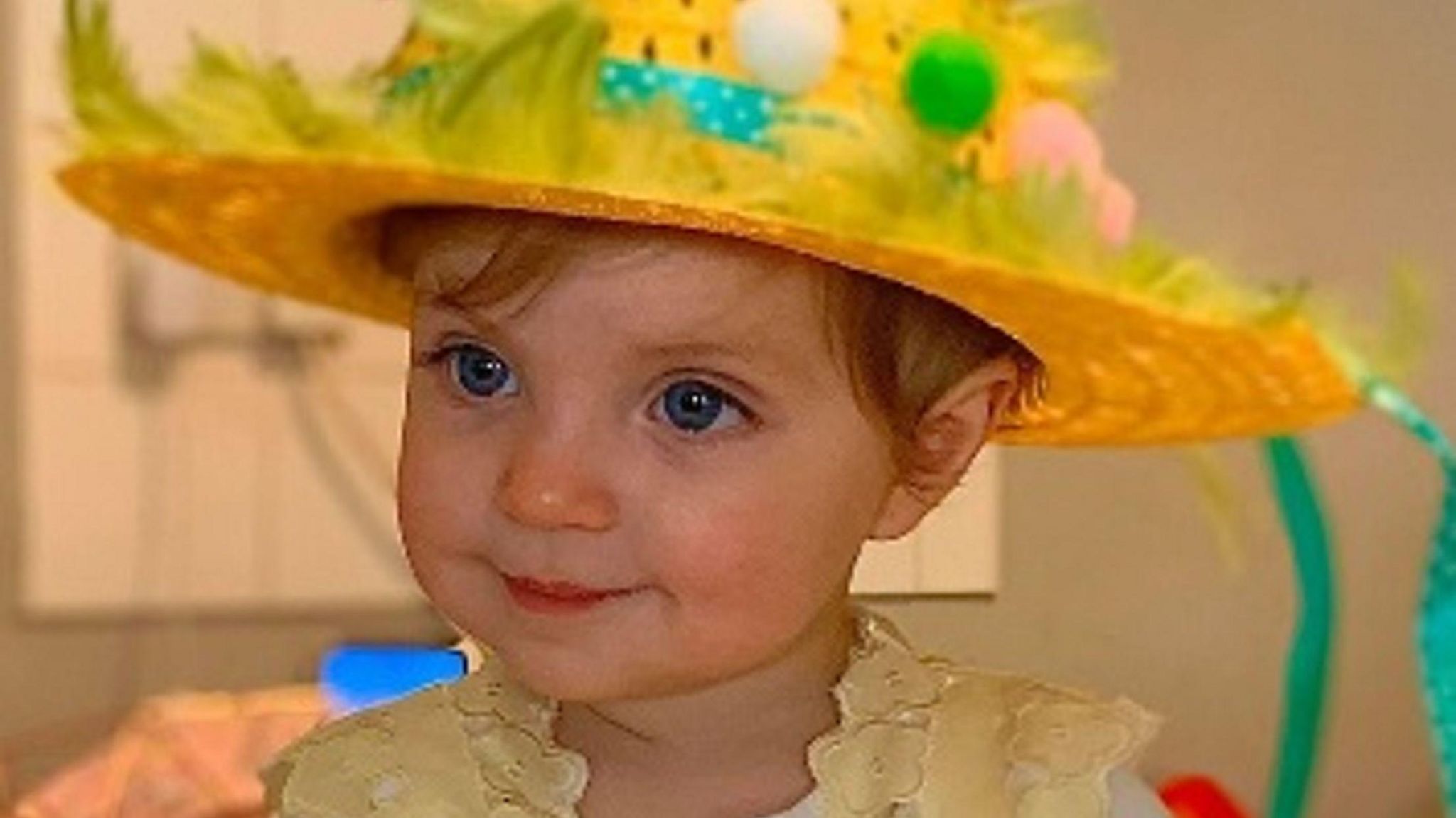 Star Hobson wearing big yellow hat smiling 