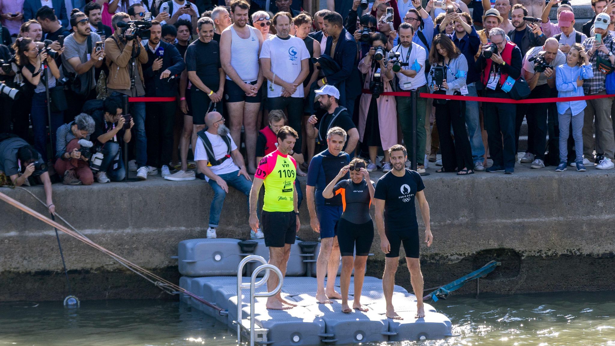 Paris mayor Anne Hidalgo prepares to swim in the River Seine to try to show that the water quality is safe for the 2024 Olympics