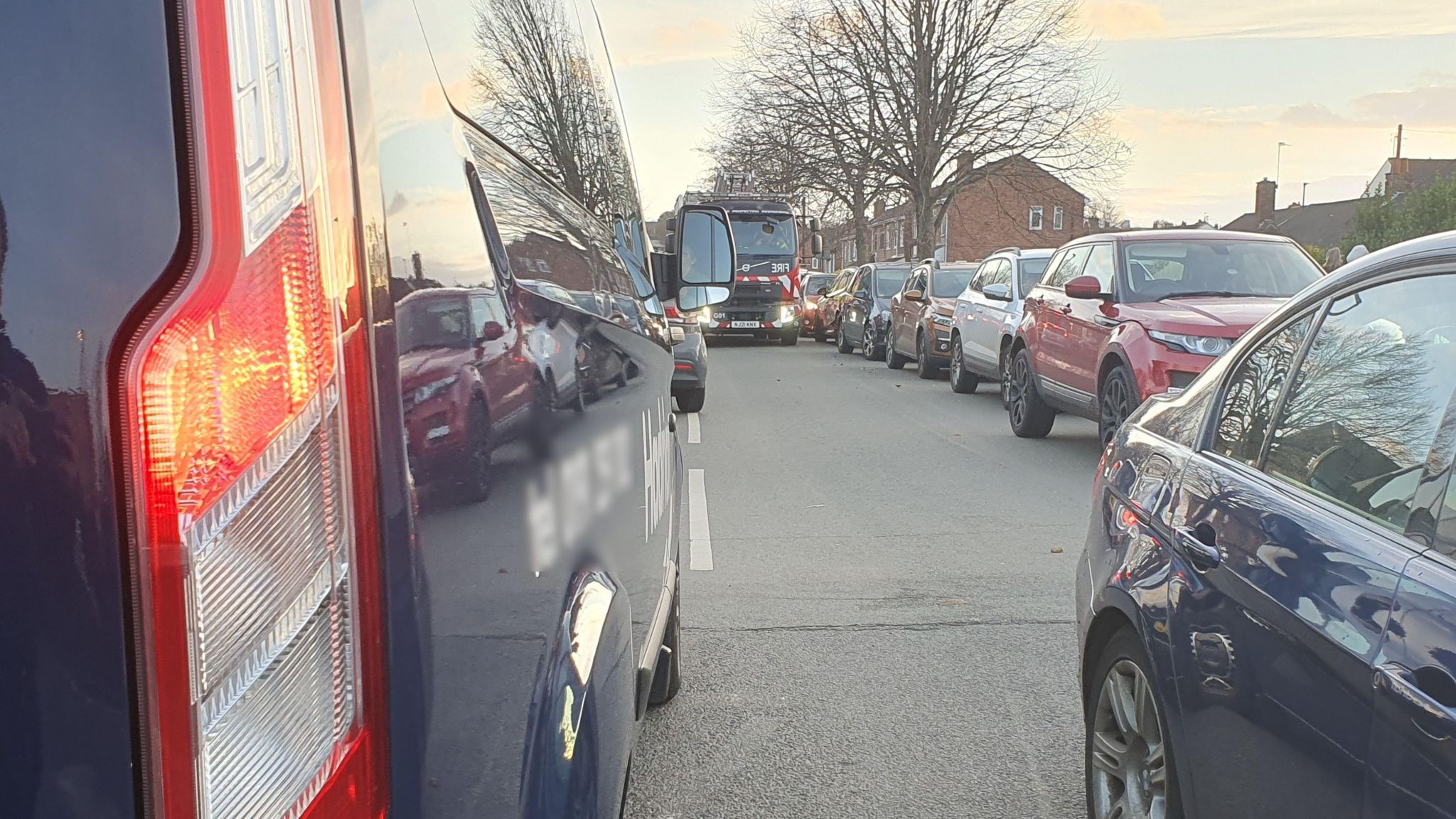 Fire engine struggling to get through road