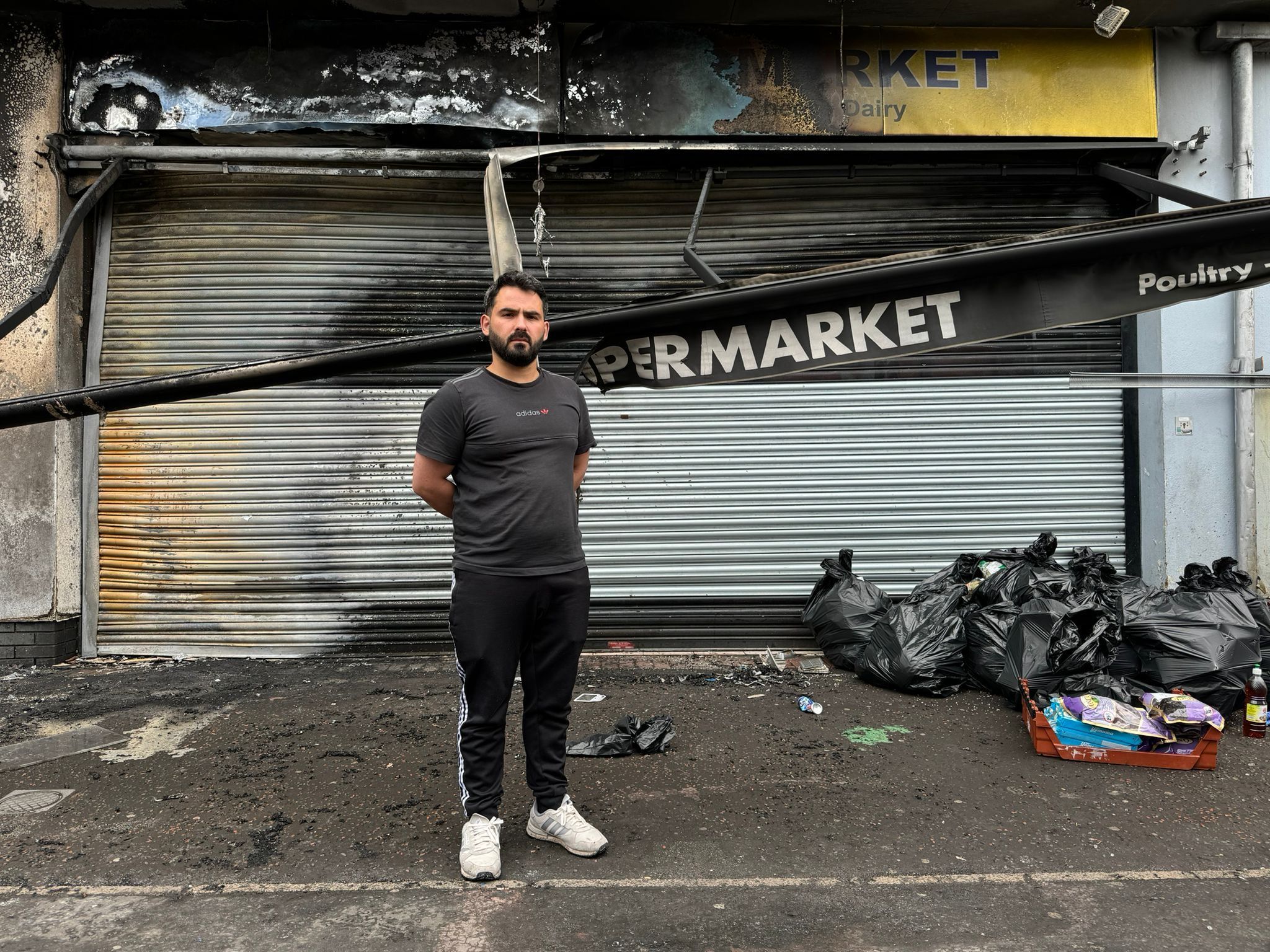 Supermarket owner, Abdelkader, at his premises on the Donegall Road area of Belfast