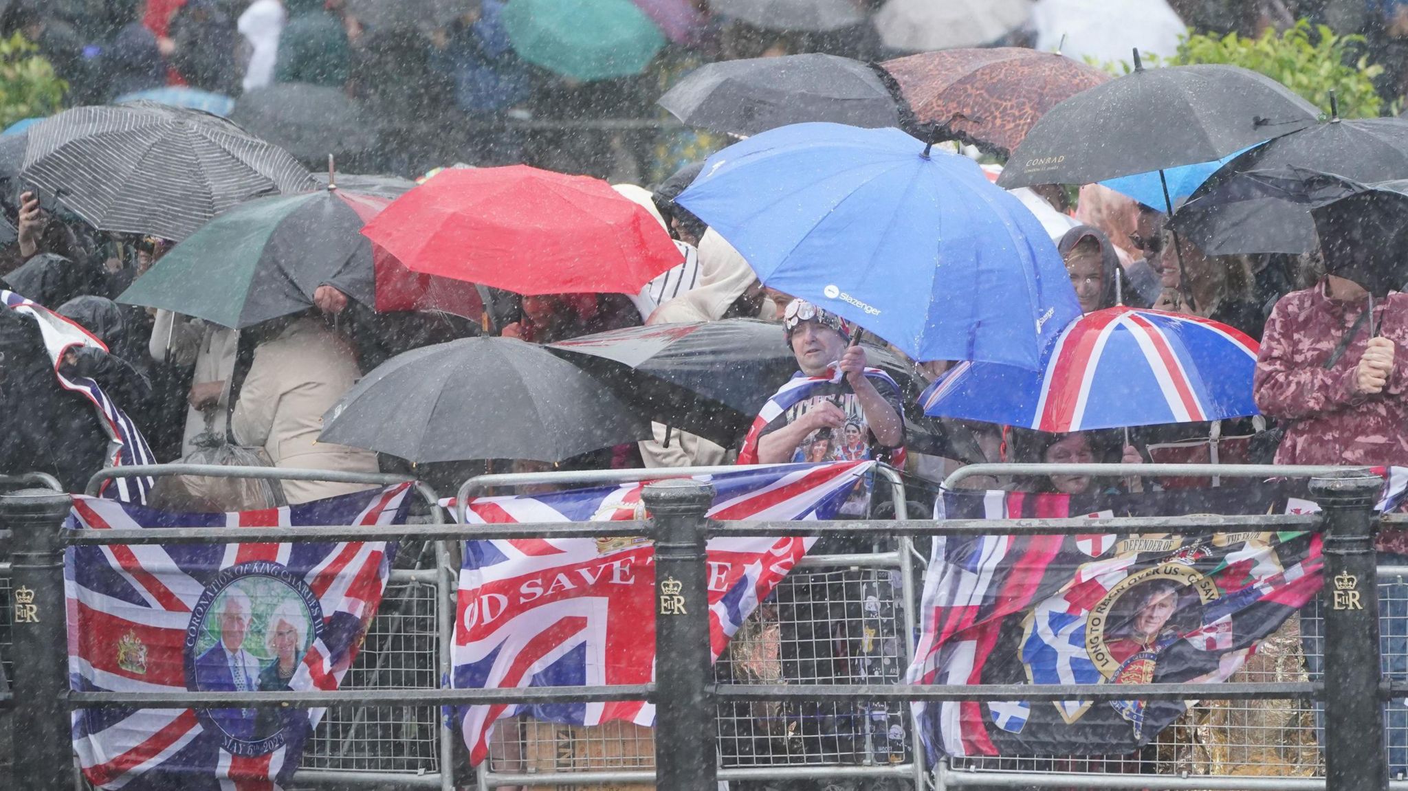 Crowns sheltering from rain at Trooping the Colour