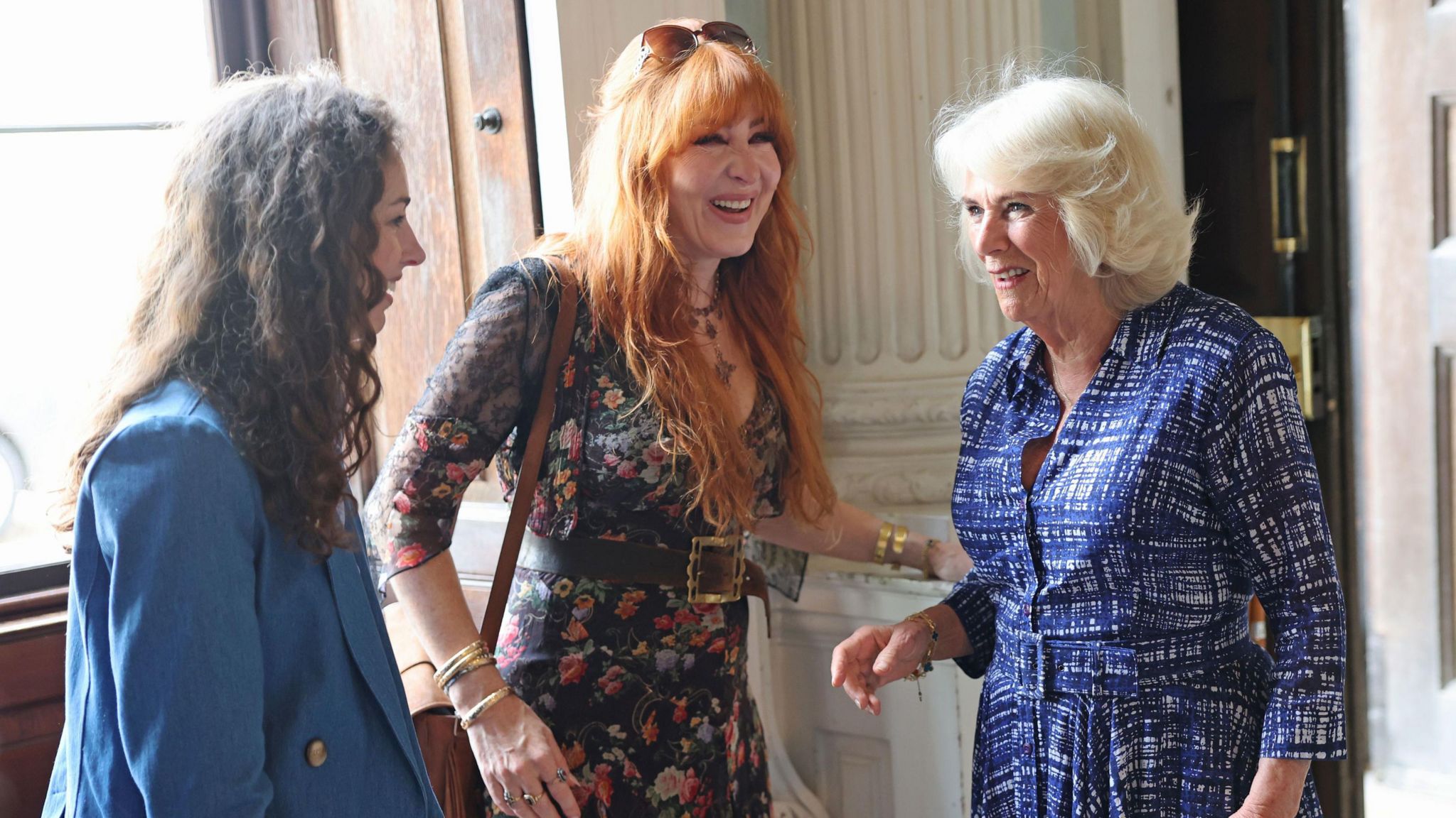 The Marchioness of Cholmondeley, Rose Hanbury, and beauty entrepreneur, Charlotte Tilbury, chatting with Queen Camilla 