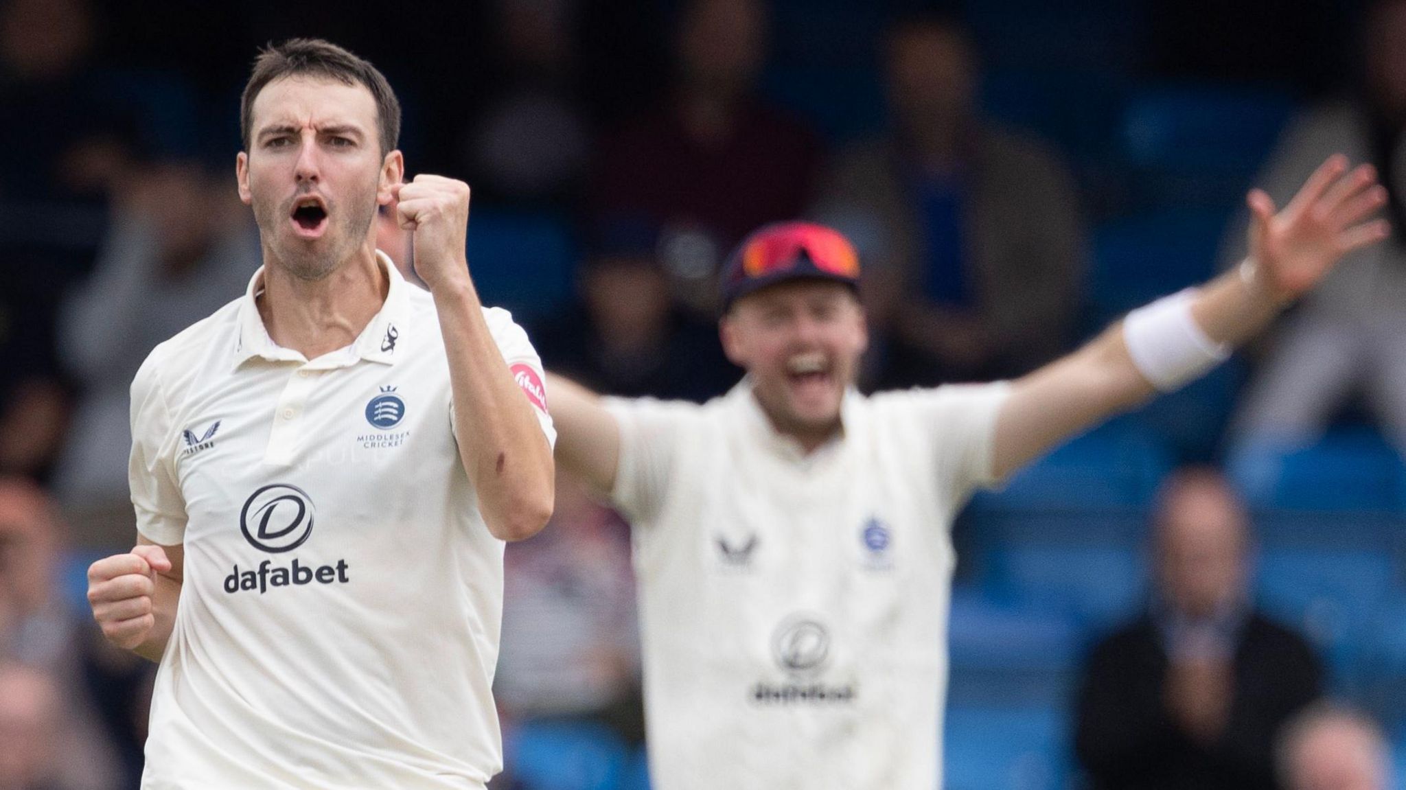 Toby Roland-Jones takes a wicket for Middlesex