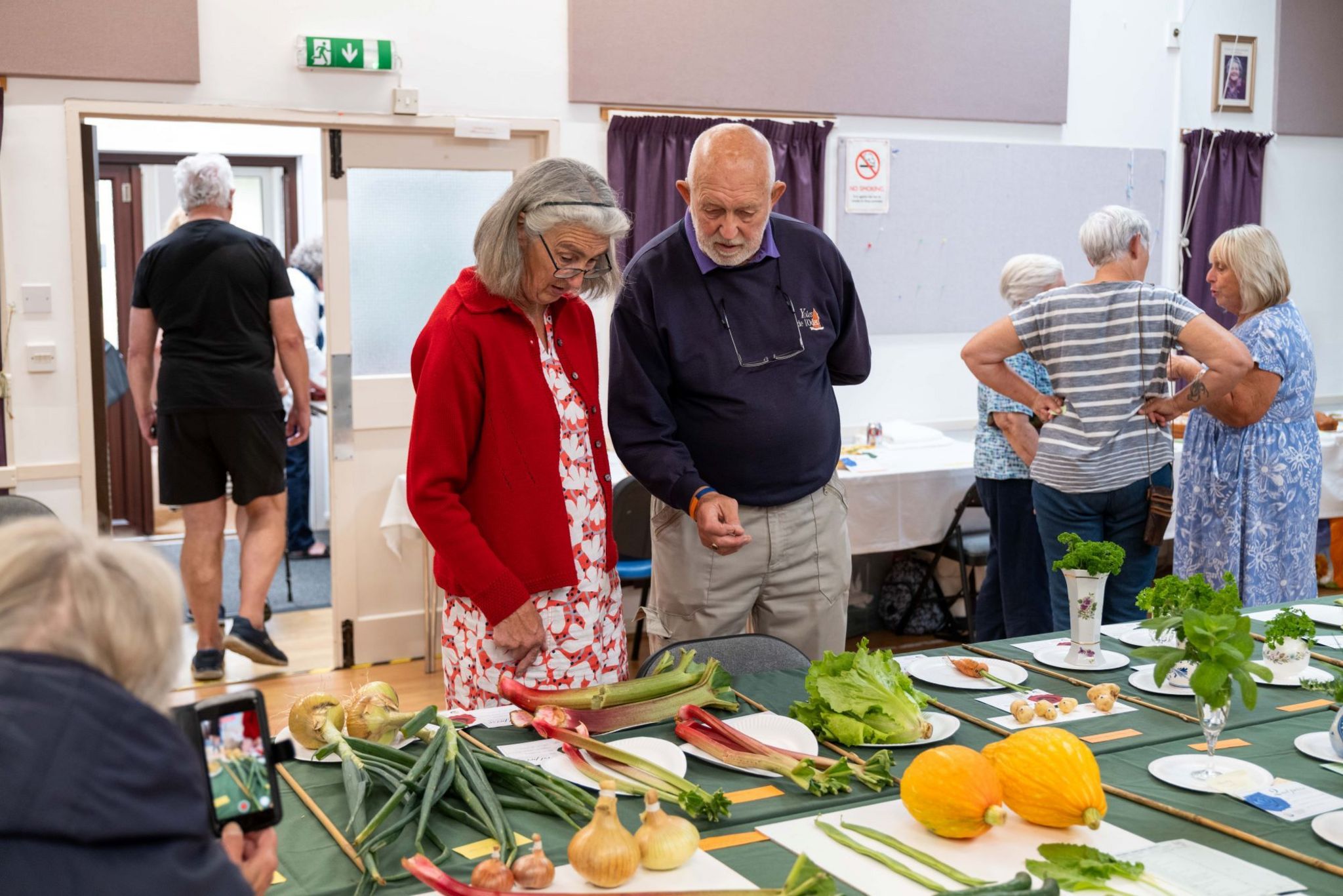 Admiring the rhubarb on display