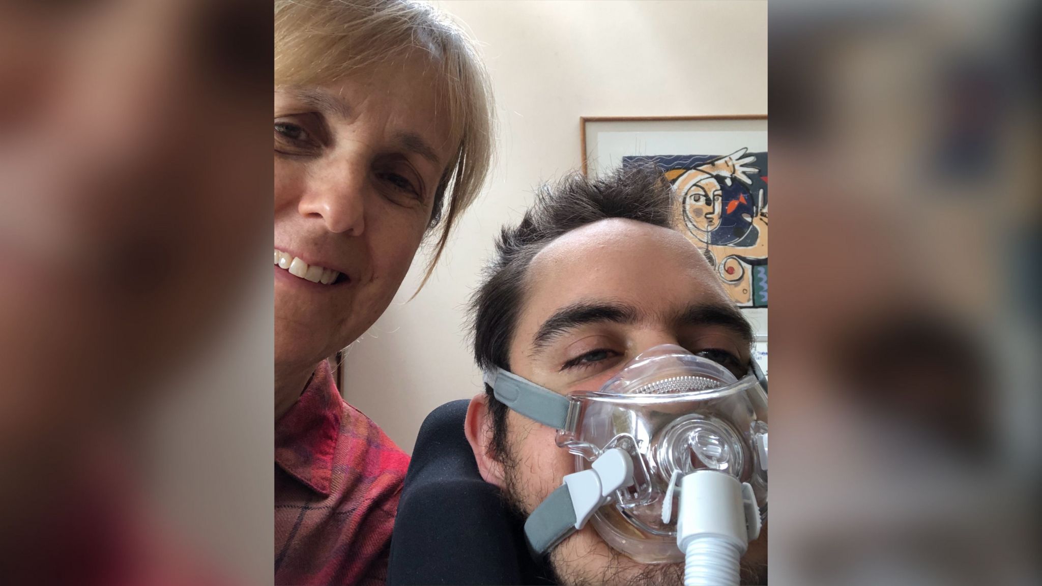 Emma MacLennan with her son Alex Wade who wears breathing apparatus