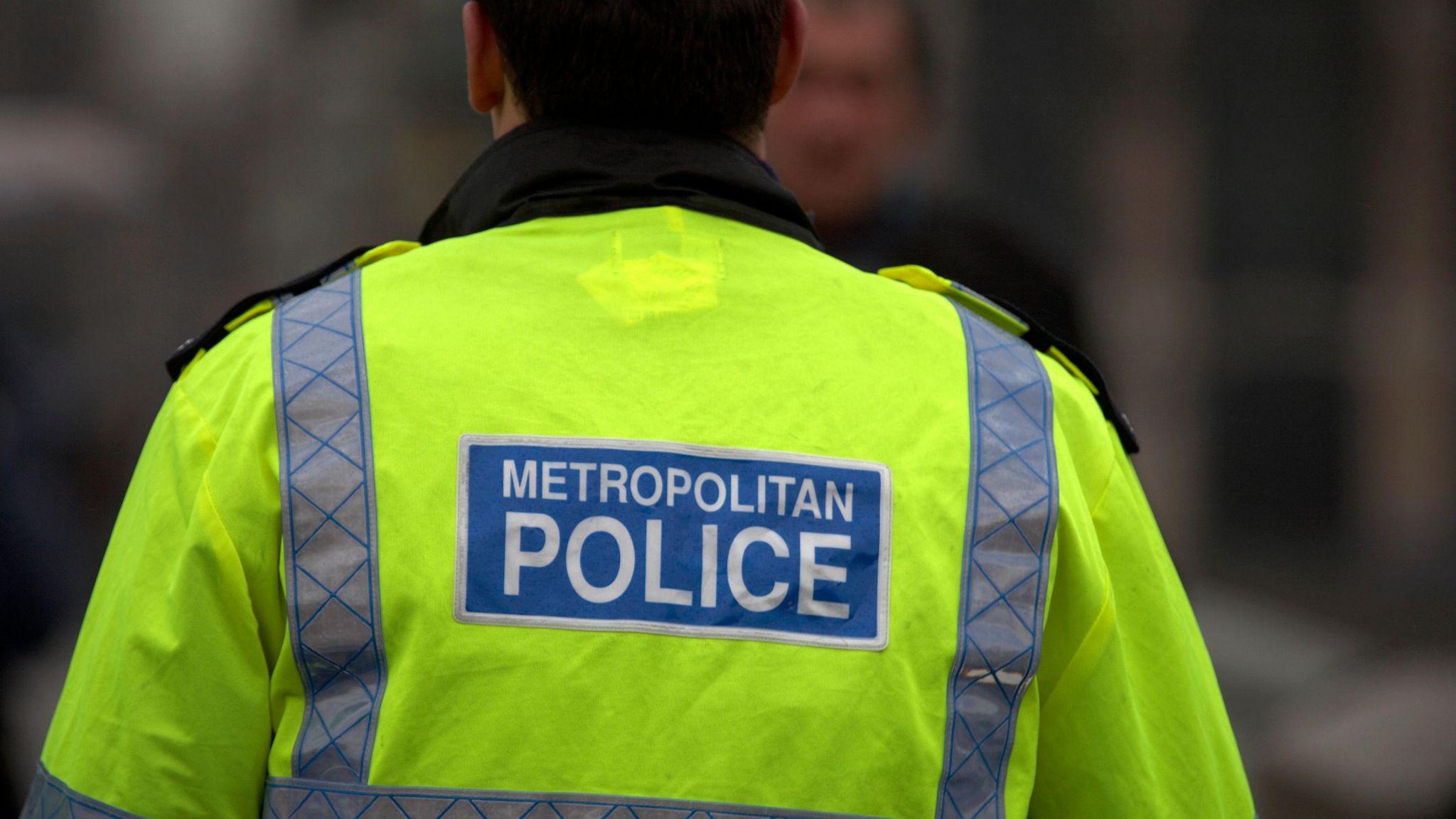 Met police officer pictured from behind