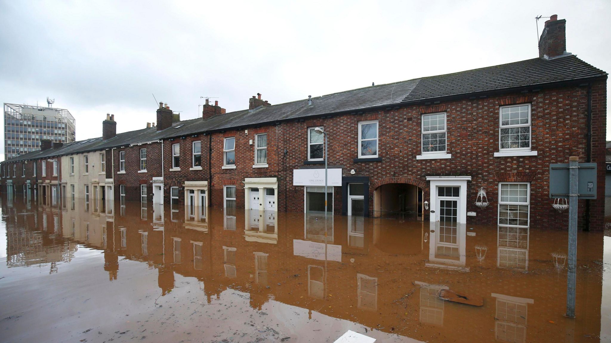 Street submerged under flood waters in Carlisle after Storm Desmond in 2015