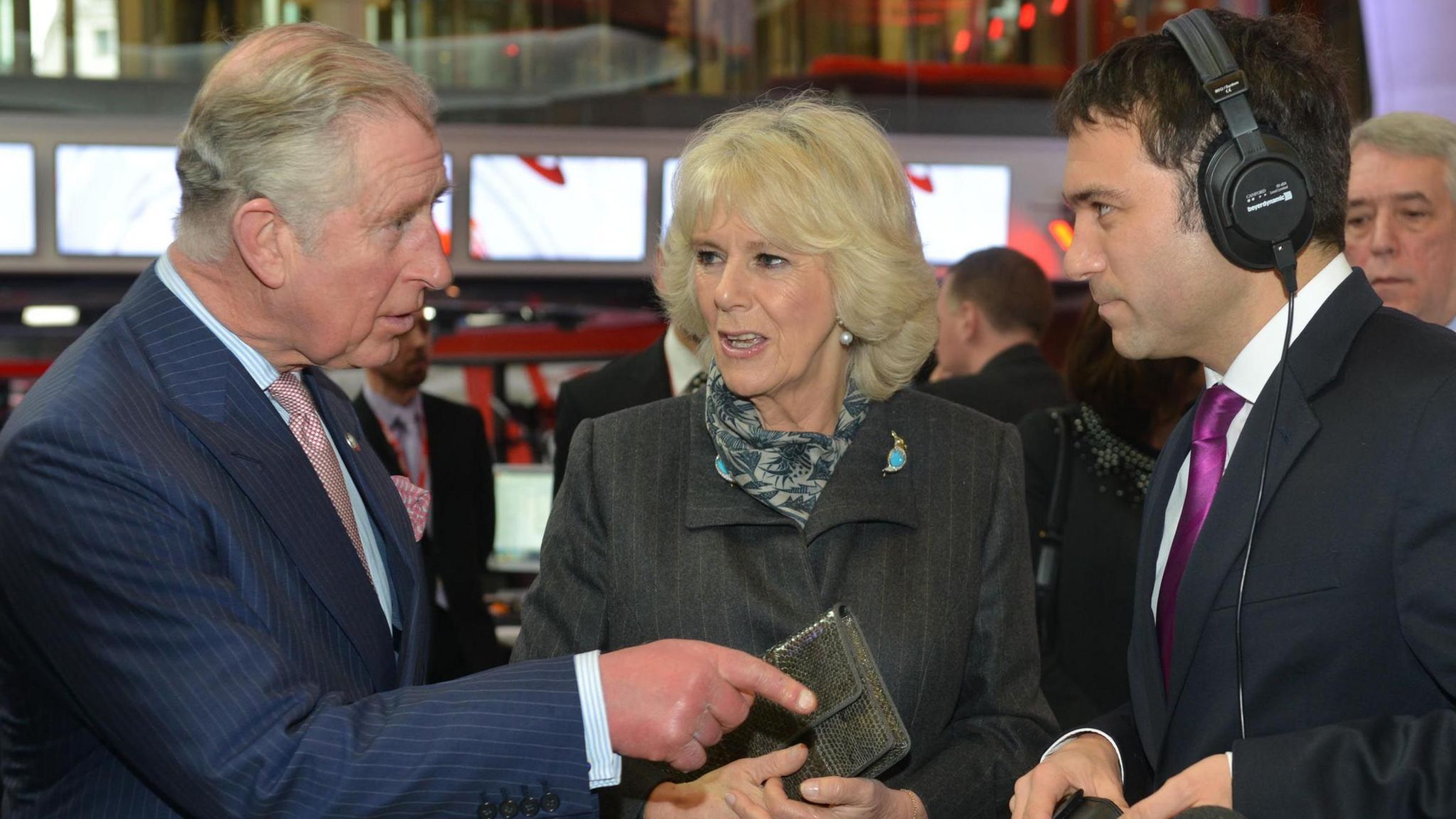 King Charles and Queen Camilla speak to BBC journalist Ros Atkins on a visit to the BBC in 2014 