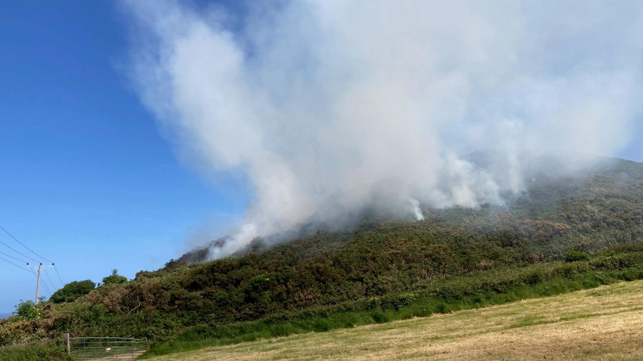 Smoke over Cwm Mountain, Conwy county, on Friday