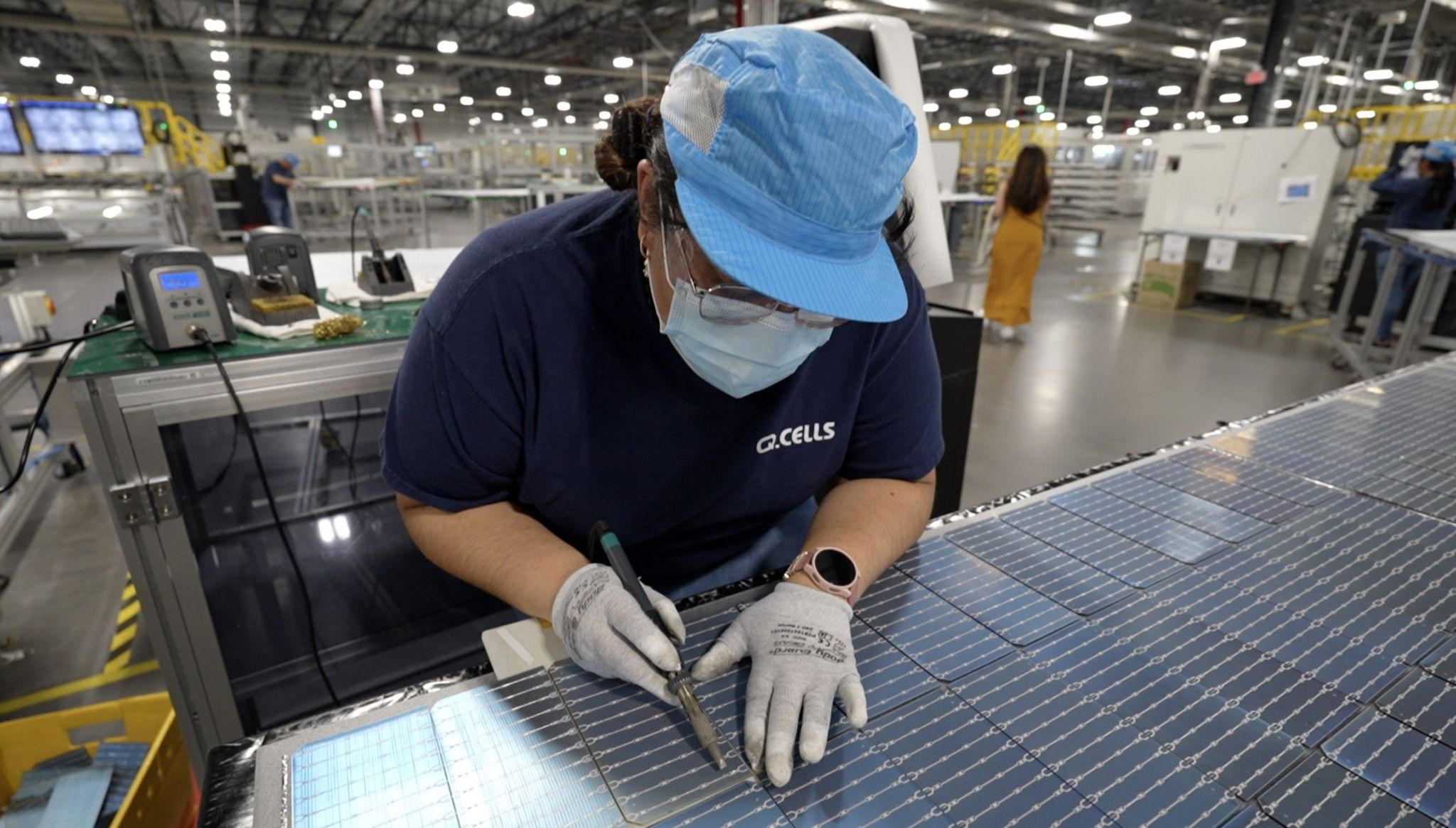 A worker at Qcells' factory in Dalton