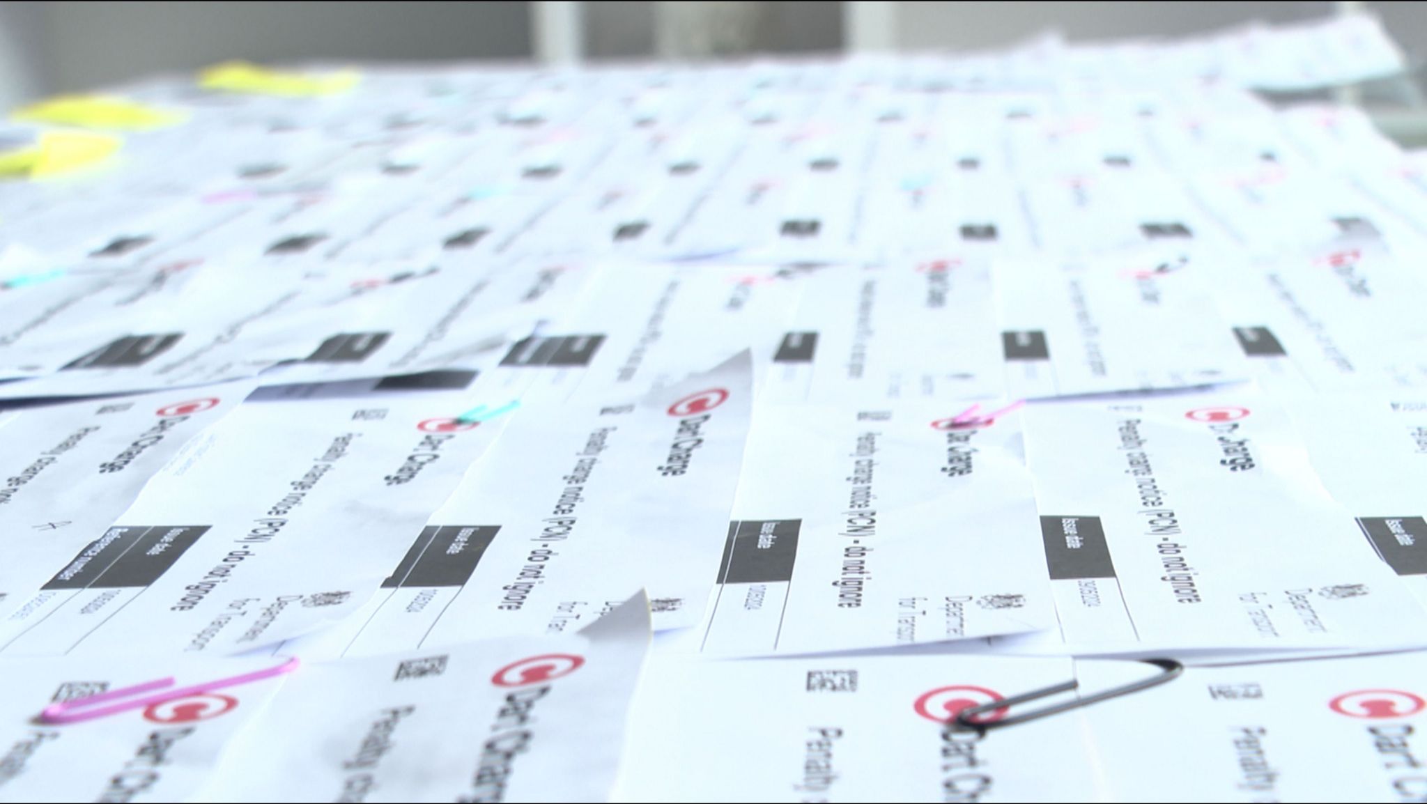 A table covered in Dart Charge fines