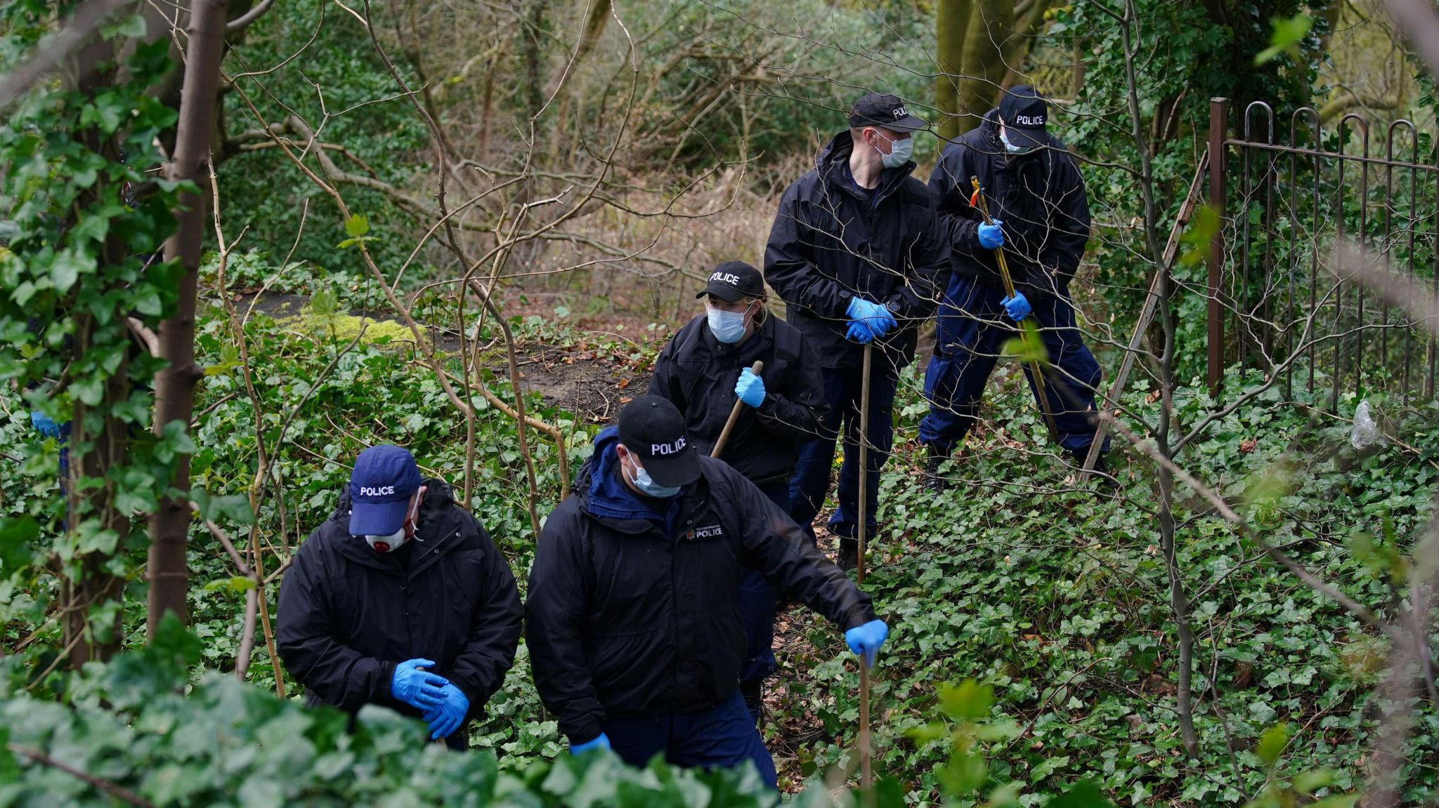 Police officers search Kersal Dale woodlands in April