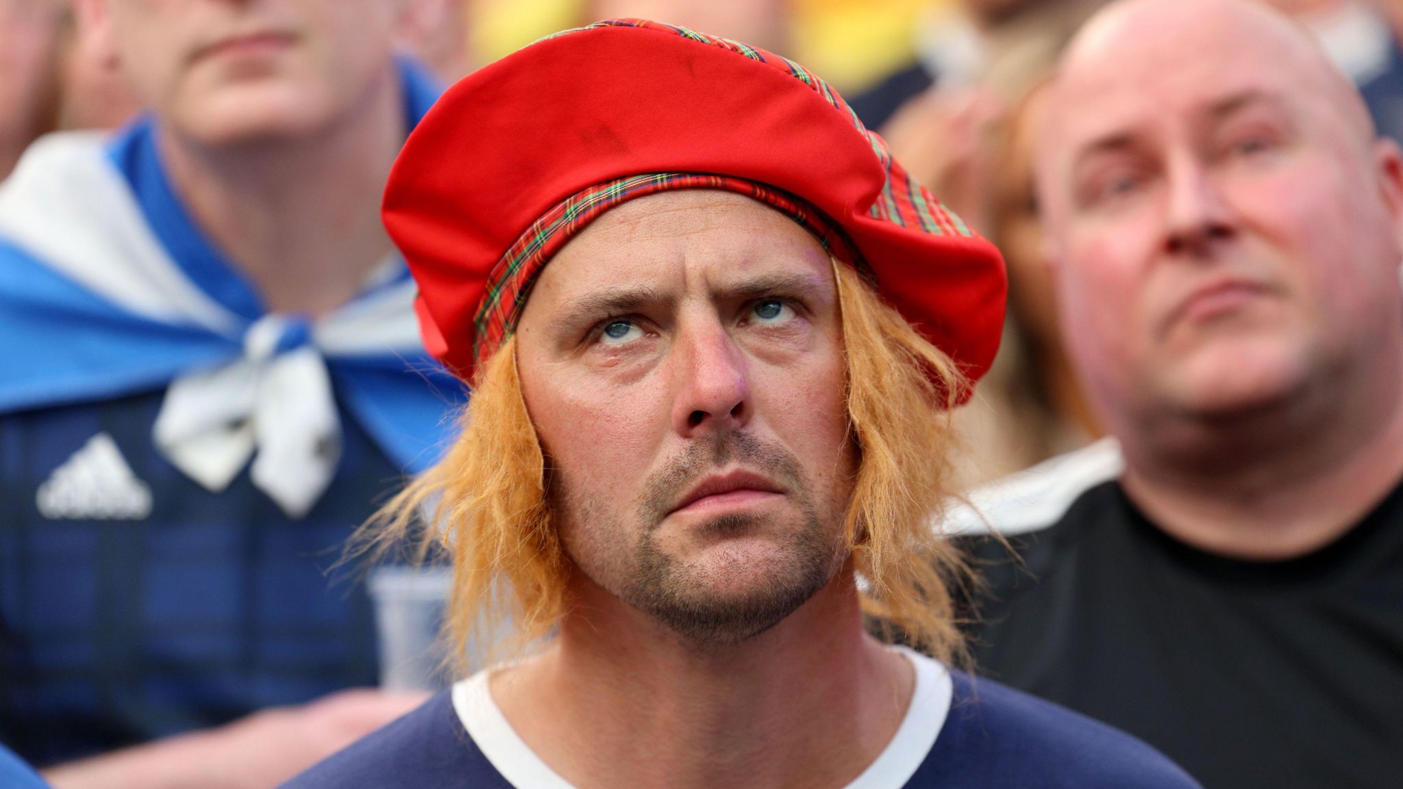Scotland fans react during their defeat to Germany