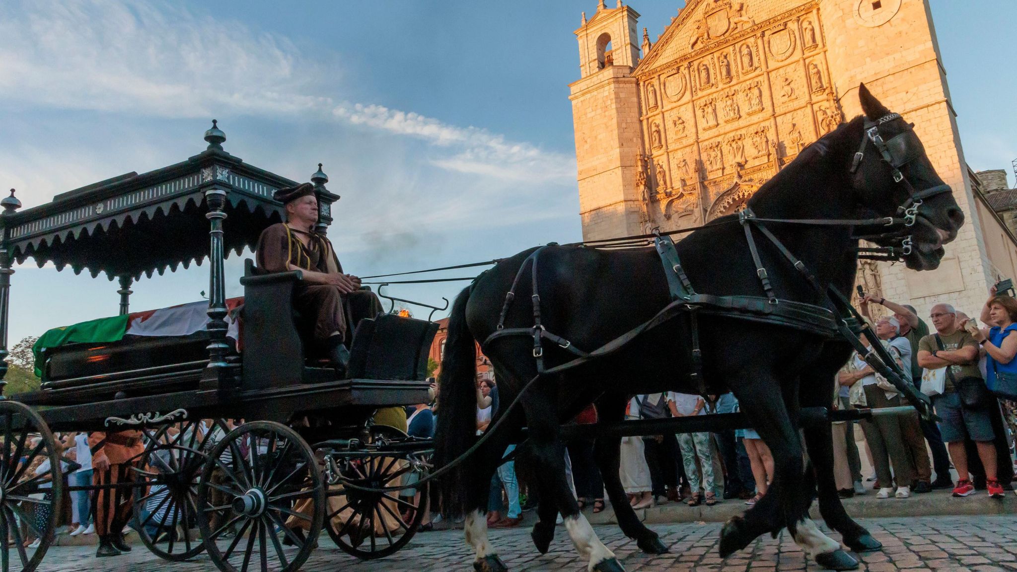A horse-drawn carriage led the coffin through Valladolid