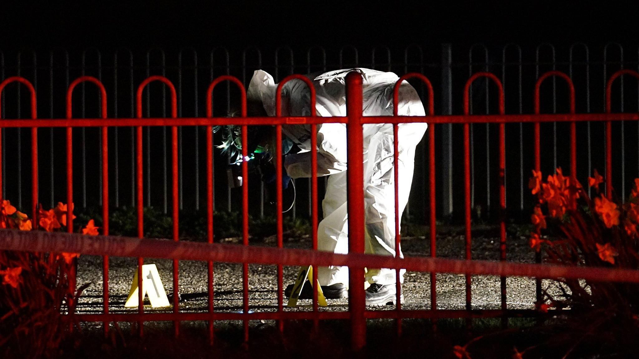 An investigator at the crime scene