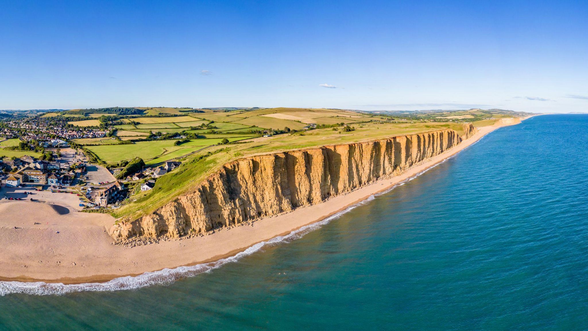 An aerial shot of cliffs at West Bay in Dorset
