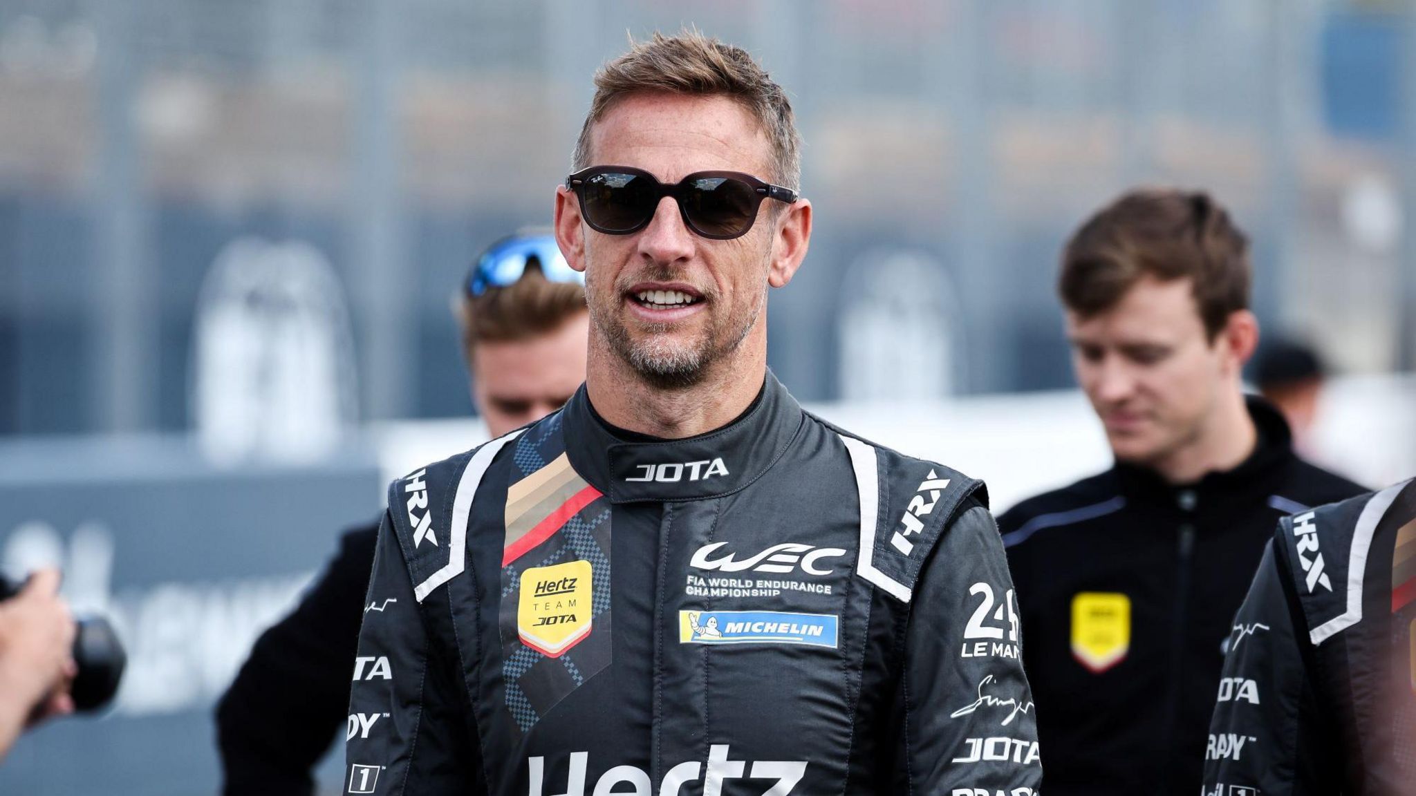 Jenson Button walking in the paddock during Le Mans 2024 race