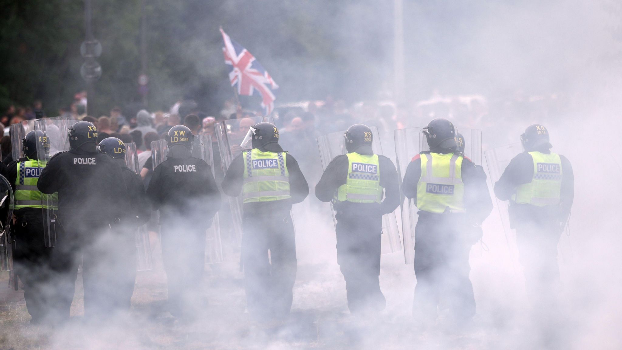 Police officers in the UK dealing with a riot