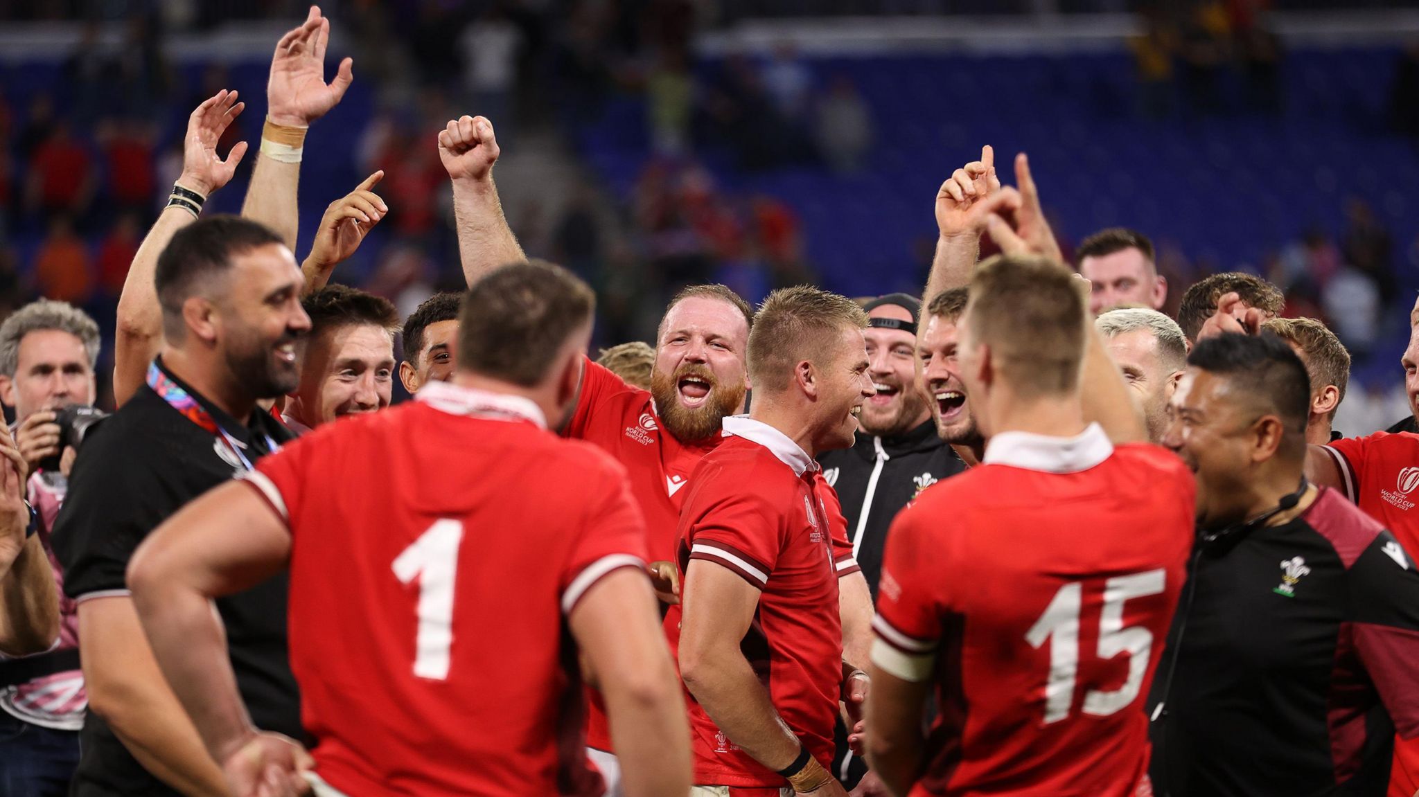 Wales squad celebrating victory against Australia in the World Cup