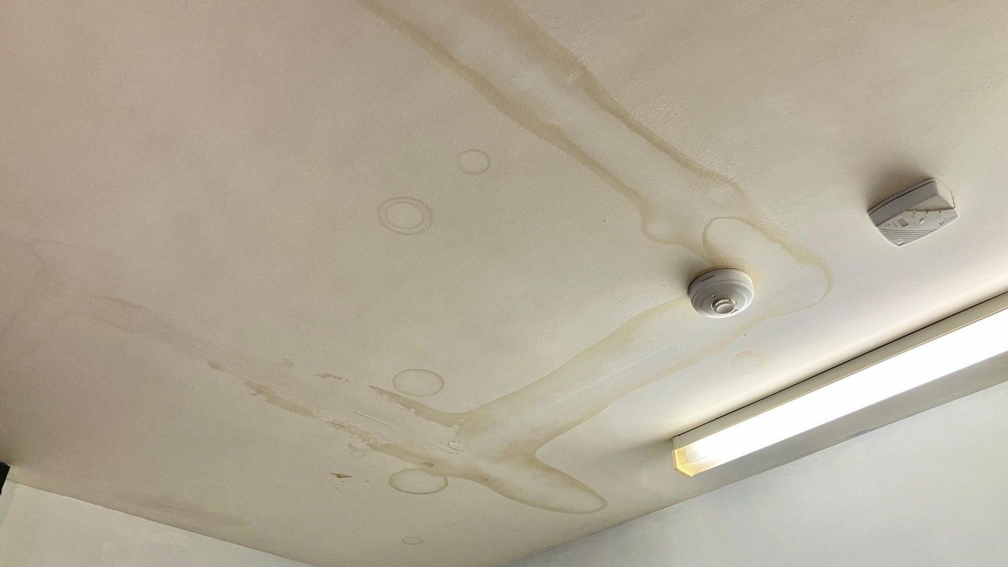 A leak appearing on a kitchen ceiling