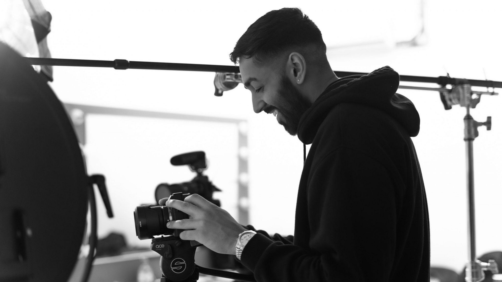 Amar Hayer with a camera