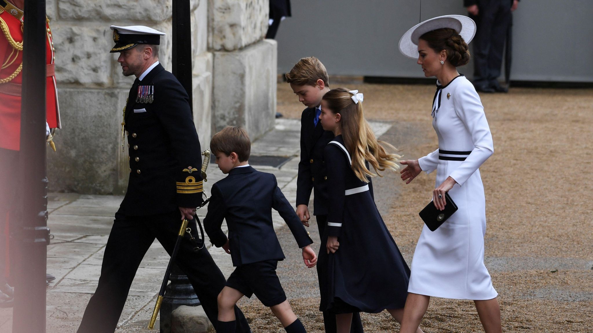 Catherine, George, Charlotte and Louis walking