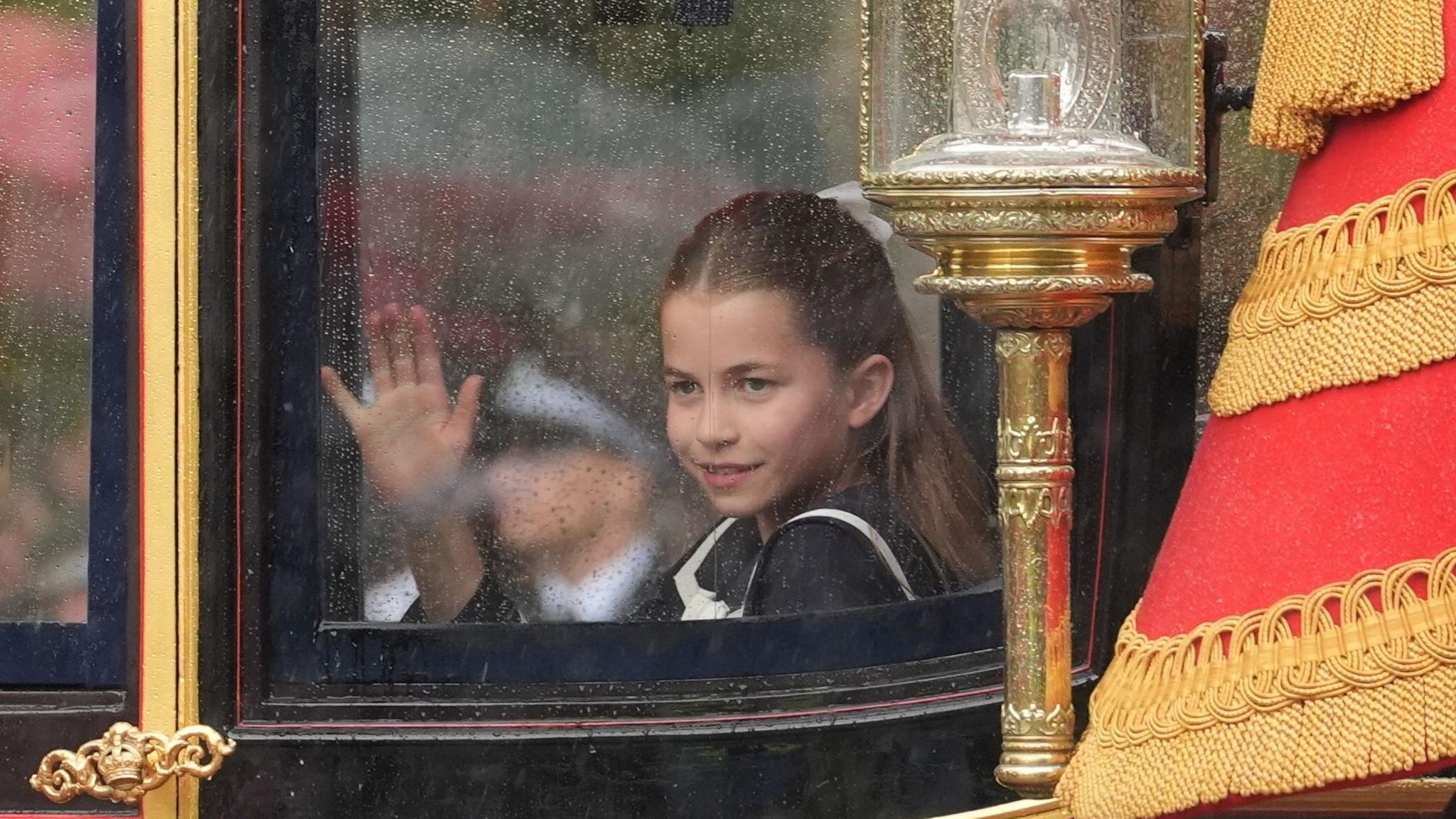 Princess Charlotte places her hand against window of steamed-up carriage