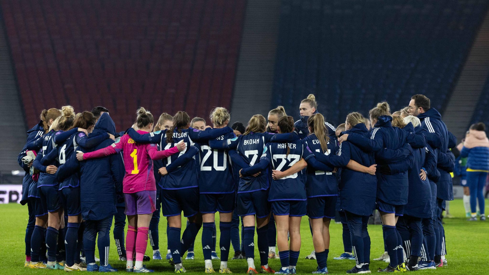 The Scotland squad huddle together at full time during a UEFA Women's Nations League match between Scotland and England at Hampden Park