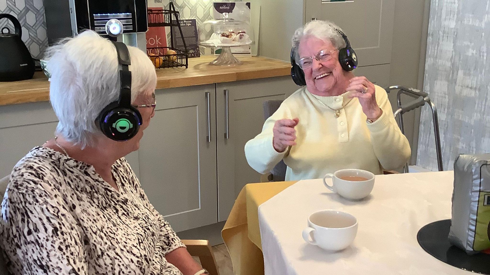 Pauline Sexton, 79, left and Pat King, 91, right, enjoying the silent disco