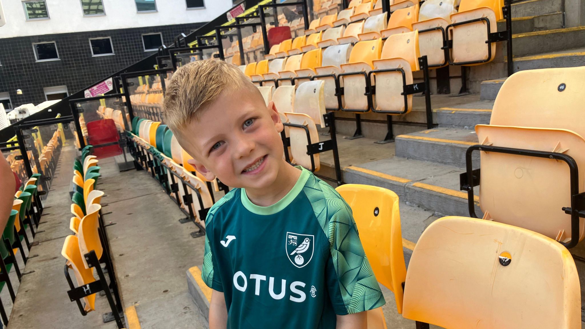 Hugo looking at the camera wearing the Norwich training kit