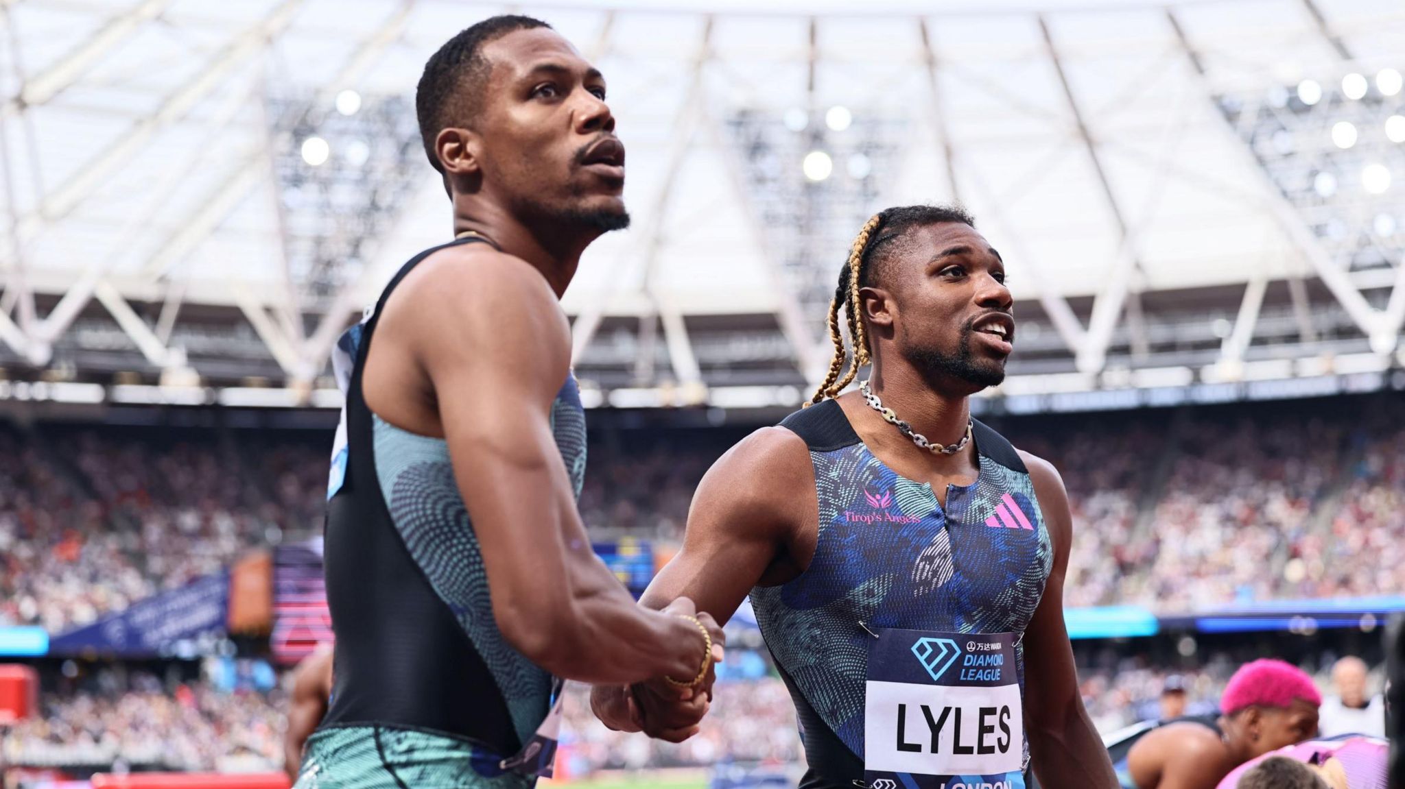 Zharnel Hughes and Noah Lyles shake hands